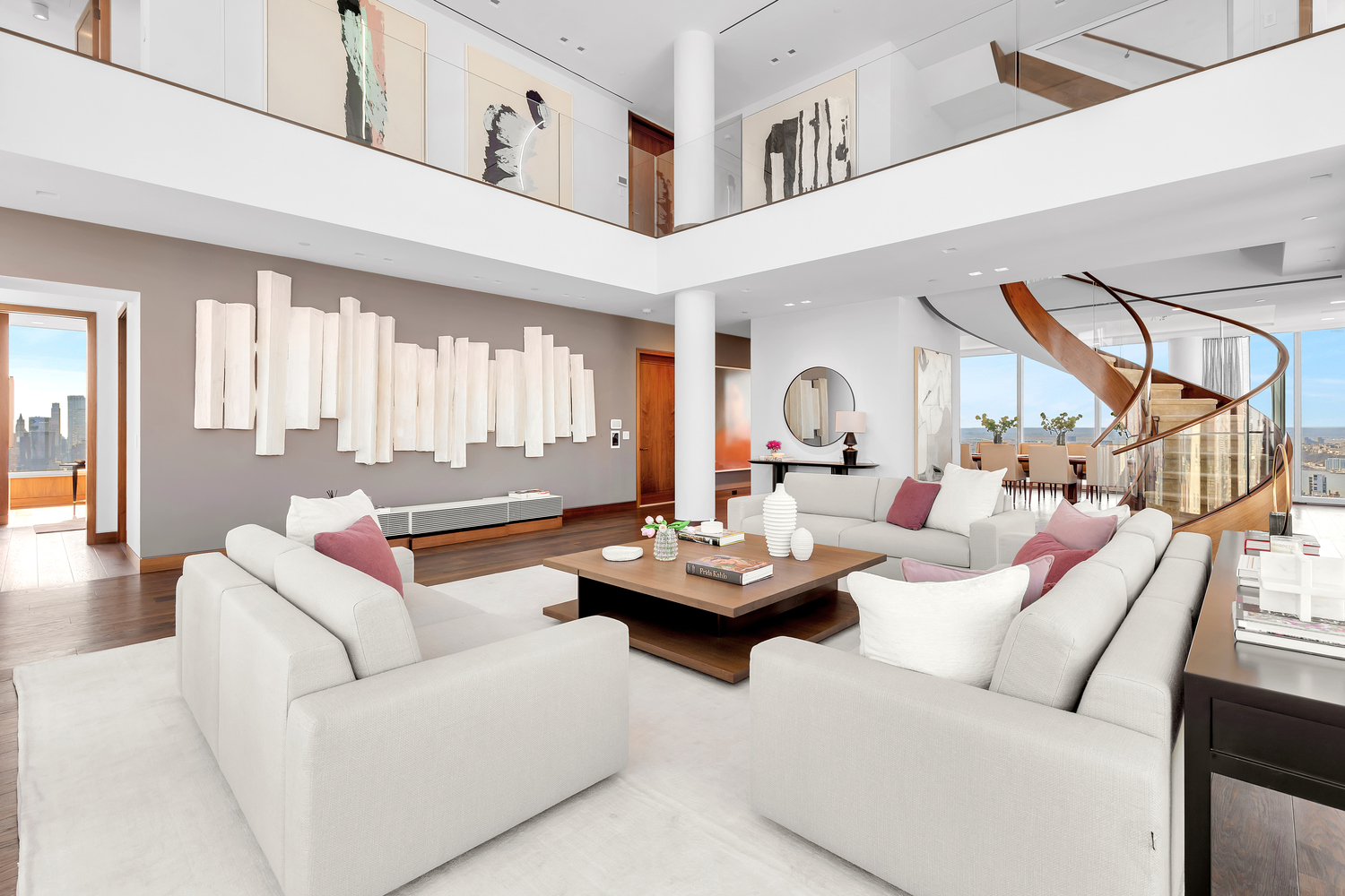 23 East 22nd Street, Unit PH Manhattan, NY 10010 - Photo 2 of 32 a living room with furniture and a large window