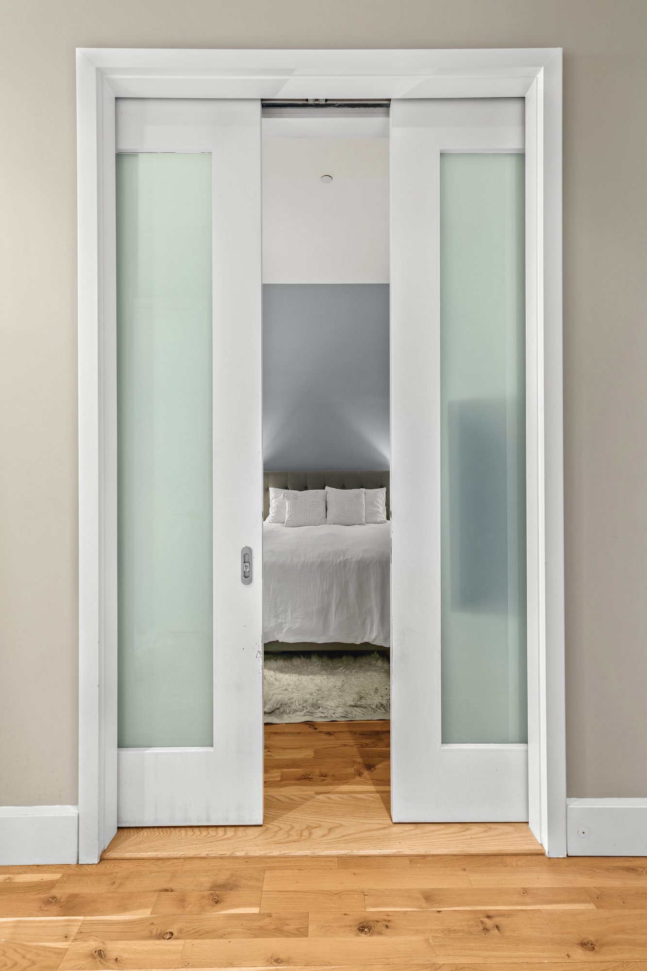 360 Furman Street, Unit 616 Brooklyn, NY 11201 - Photo 2 of 6 a view of a bedroom from a hallway