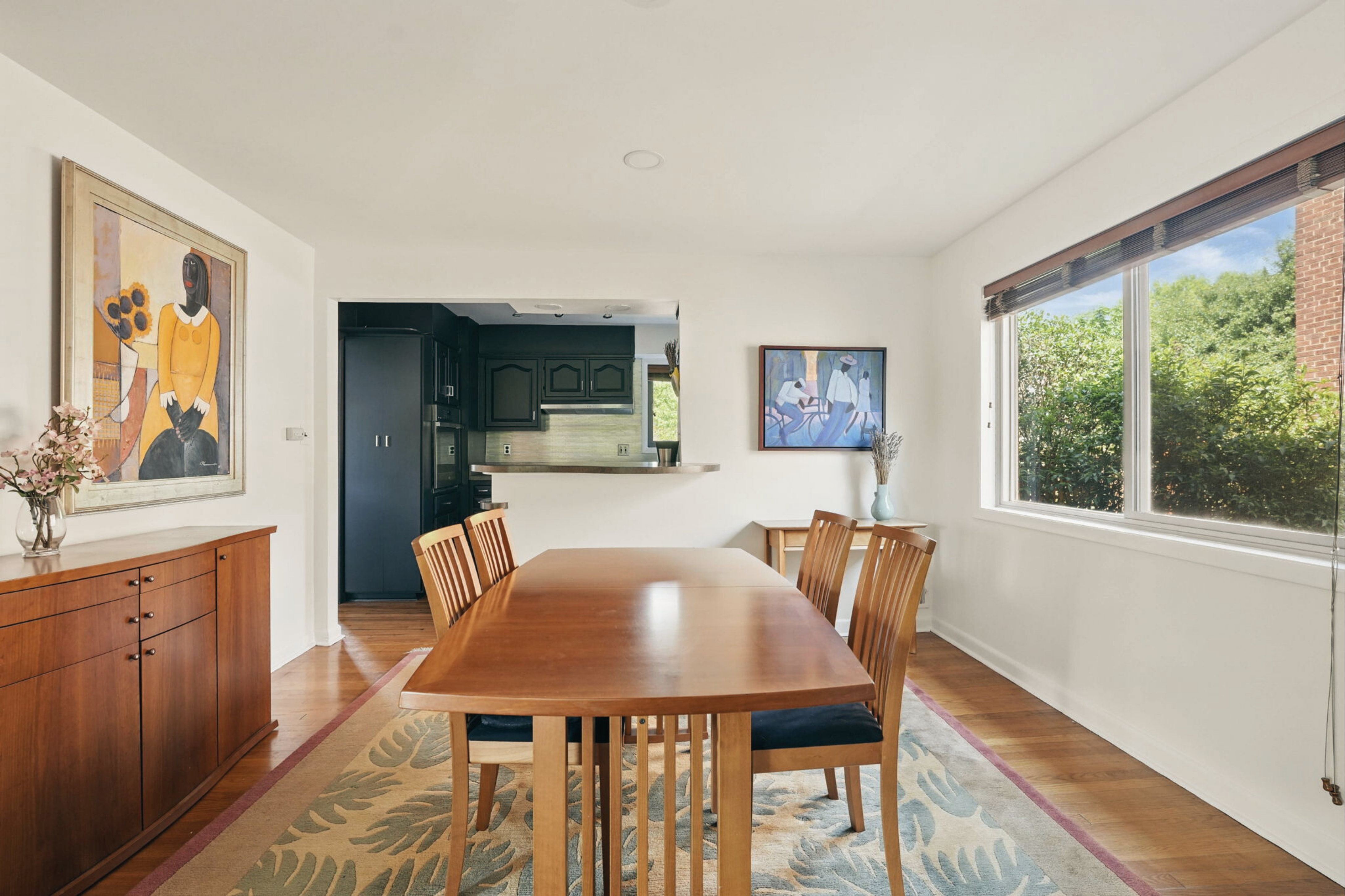 8003 16th Street Northwest Washington, DC 20012 - Photo 18 of 38 a view of a dining room with furniture window and wooden floor