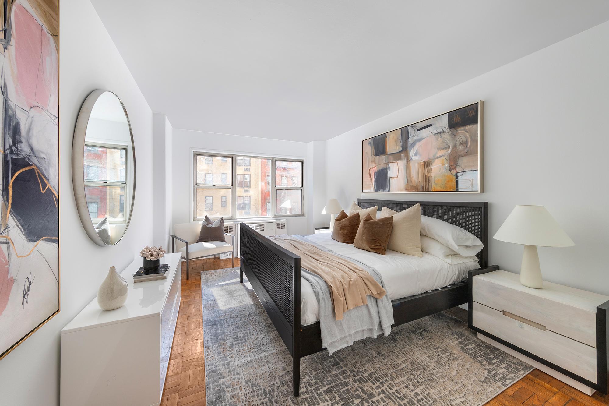 311 East 71st Street, Unit 3F Manhattan, NY 10021 - Photo 4 of 6 a bed room with bed and a large window