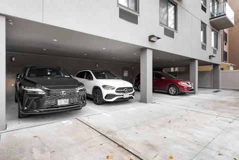 a car parked in parking area of a building
