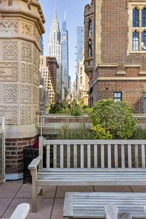 a view of a brick building from a balcony