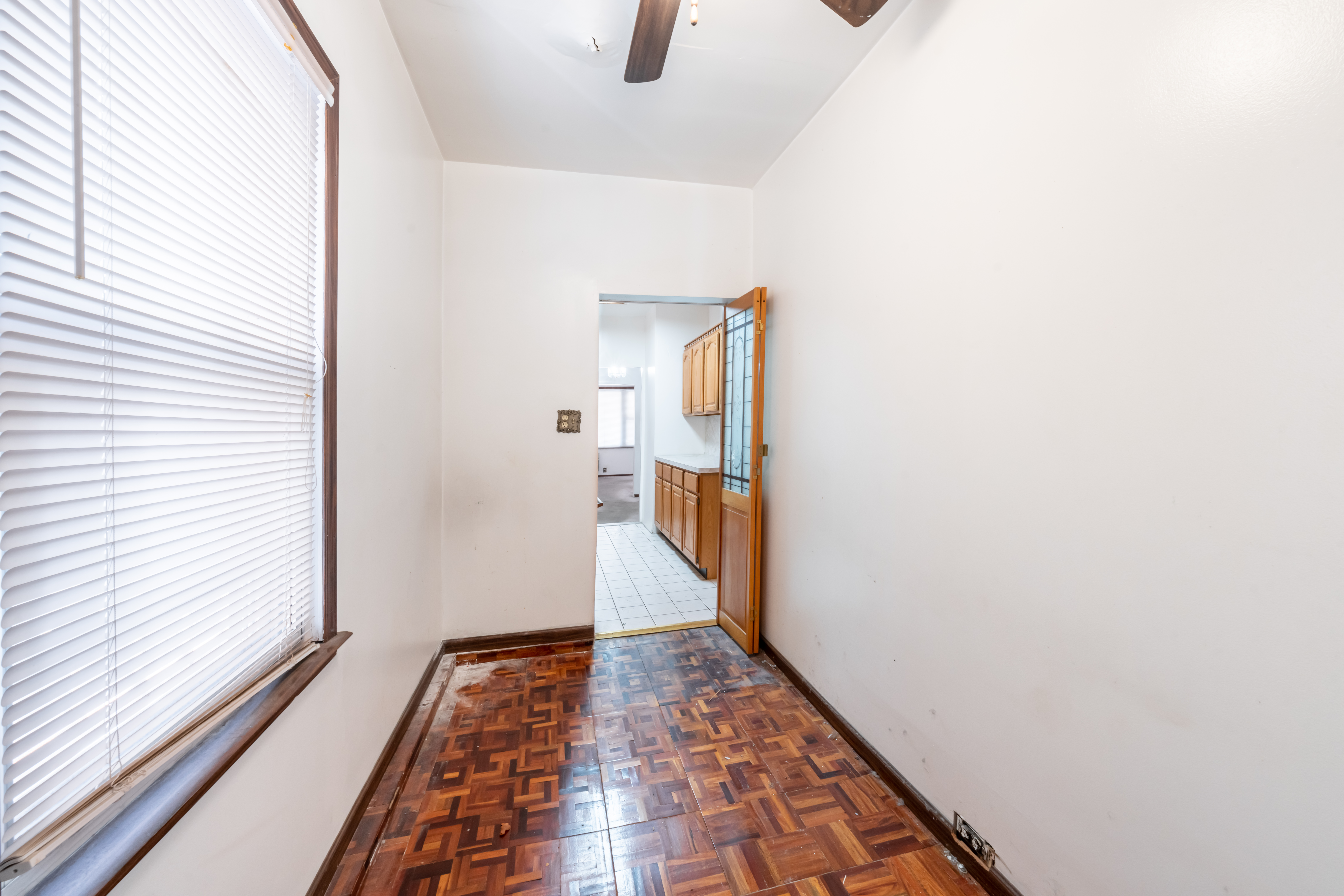1085 Arnow Avenue Bronx, NY 10469 - Photo 12 of 16 a view of a hallway with wooden floor and staircase