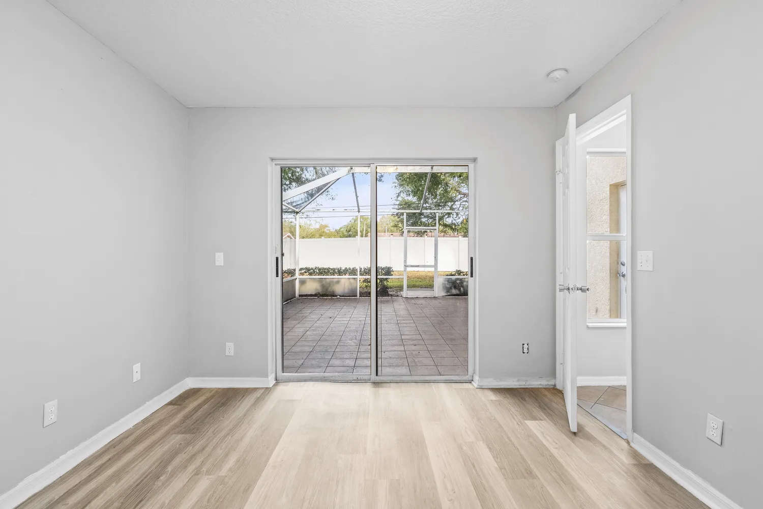 an empty room with sliding door