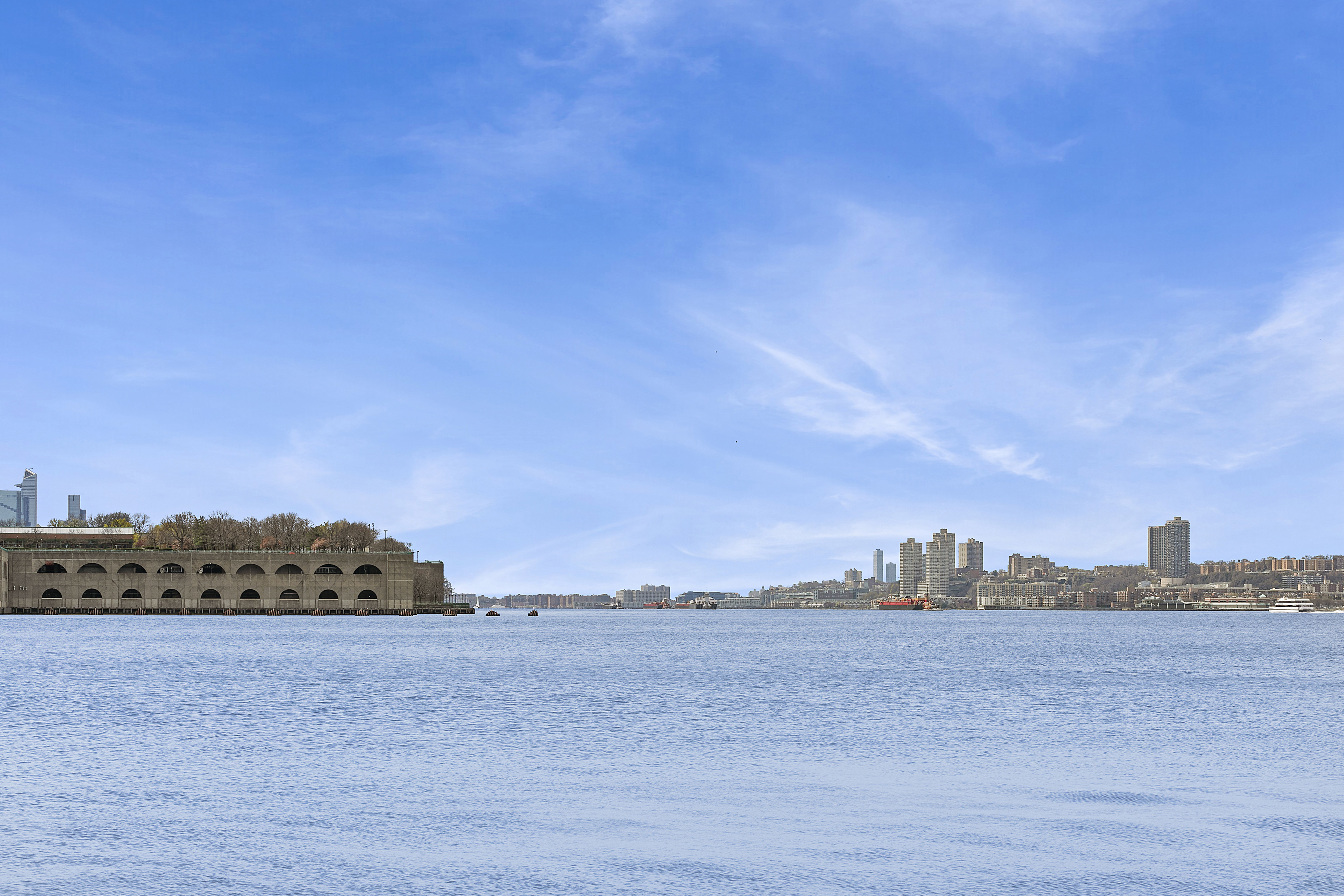158-18 Riverside Drive West, Unit 4E50 Manhattan, NY 10032 - Photo 14 of 17 a view of a large body of water and mountain in back