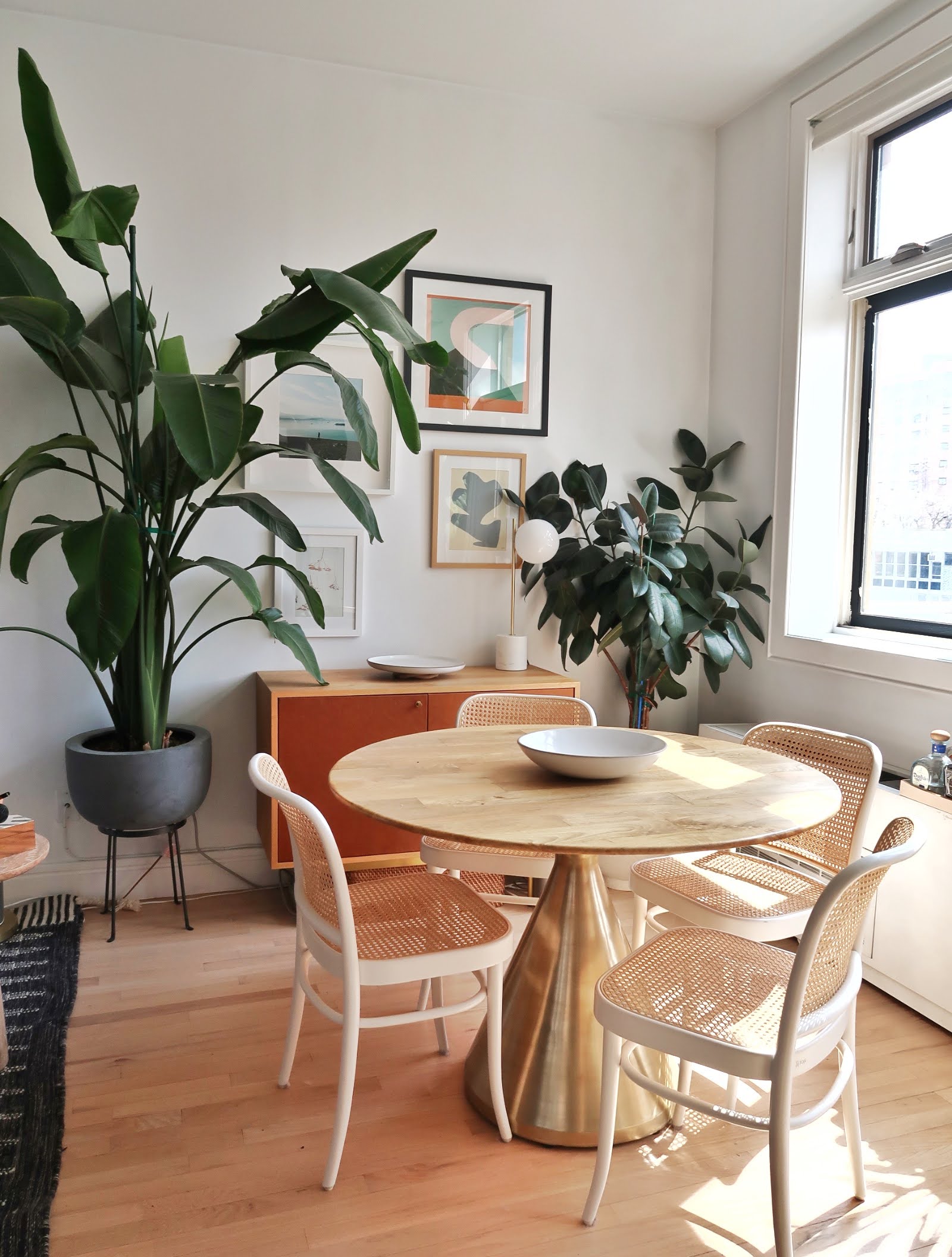 296 East 2nd Street, Unit 4G Manhattan, NY 10009 - Photo 5 of 14 a view of a dining room with furniture and wooden floor