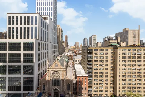 a view of a city with tall buildings