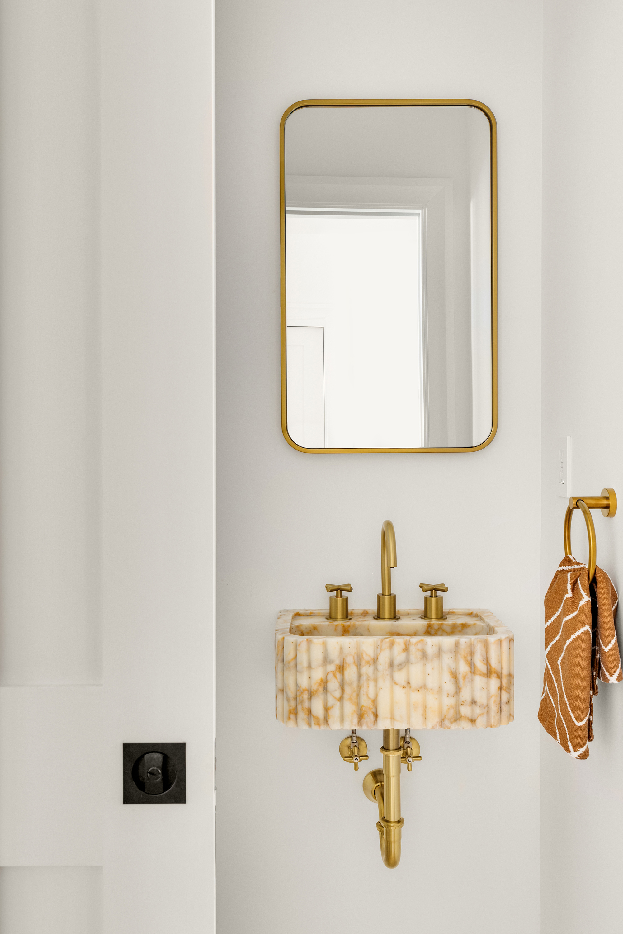 578 20th Street Brooklyn, NY 11218 - Photo 6 of 28 a bathroom with a sink and mirror