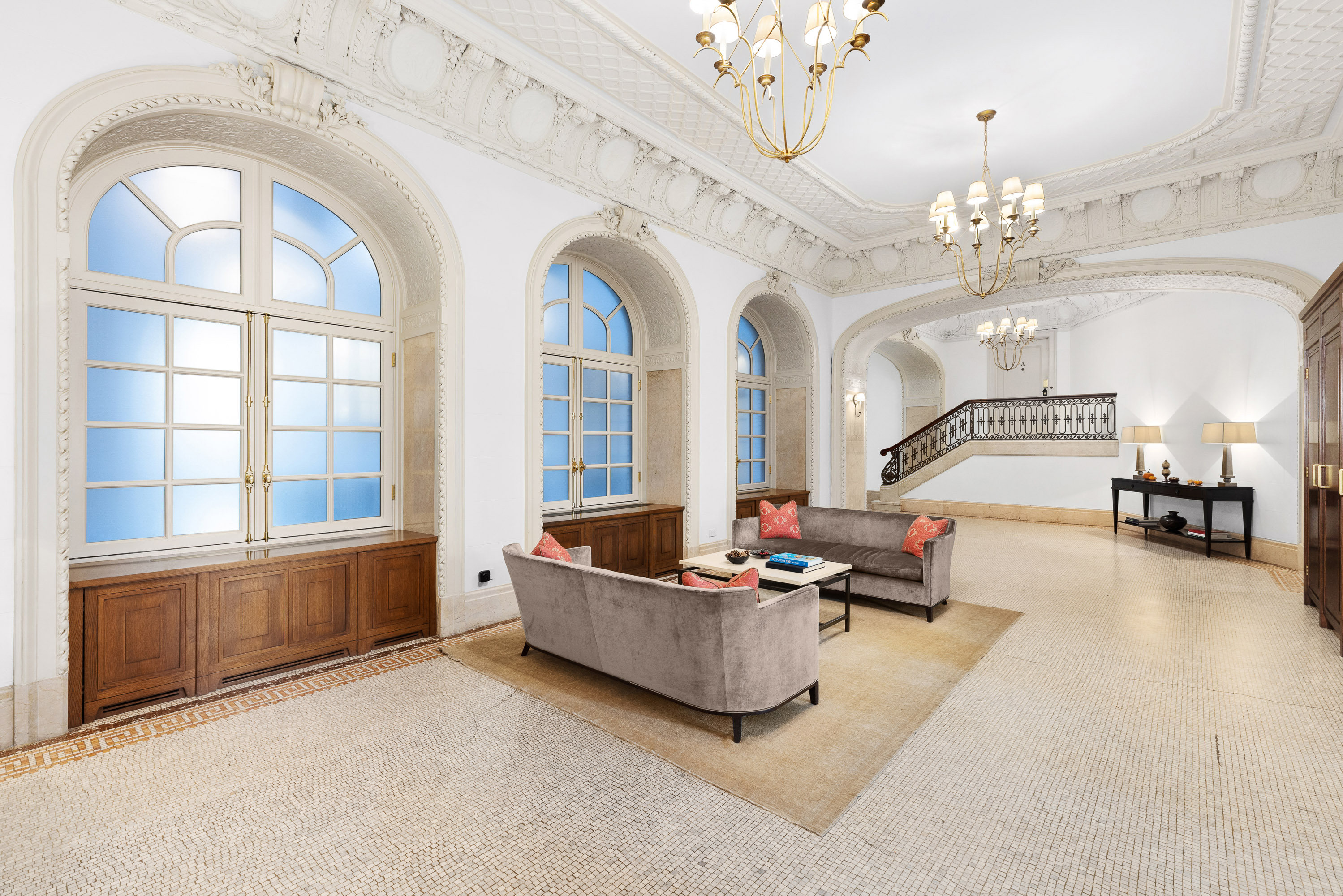 270 Riverside Drive, Unit 2C Manhattan, NY 10025 - Photo 18 of 22 a living room with furniture and a chandelier