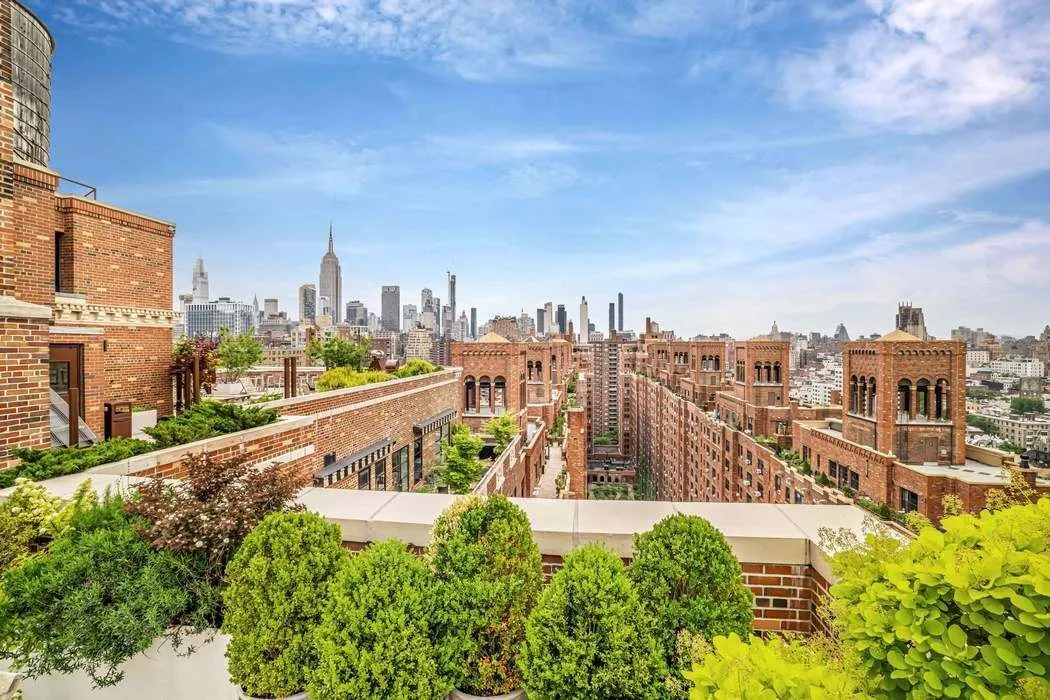 a view of a city with tall buildings