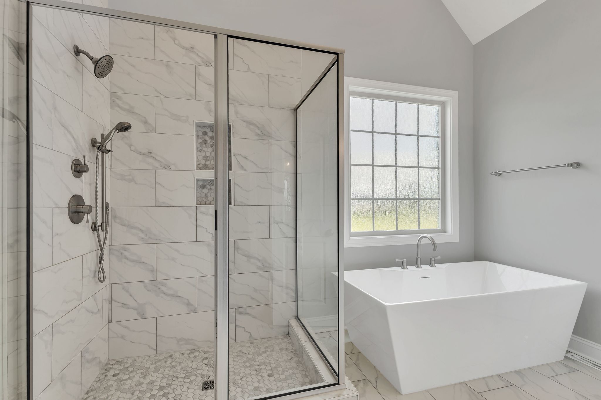 1484 Overlook Point Clarksville, TN 37043 - Photo 27 of 53 a bathroom with a bathtub and shower