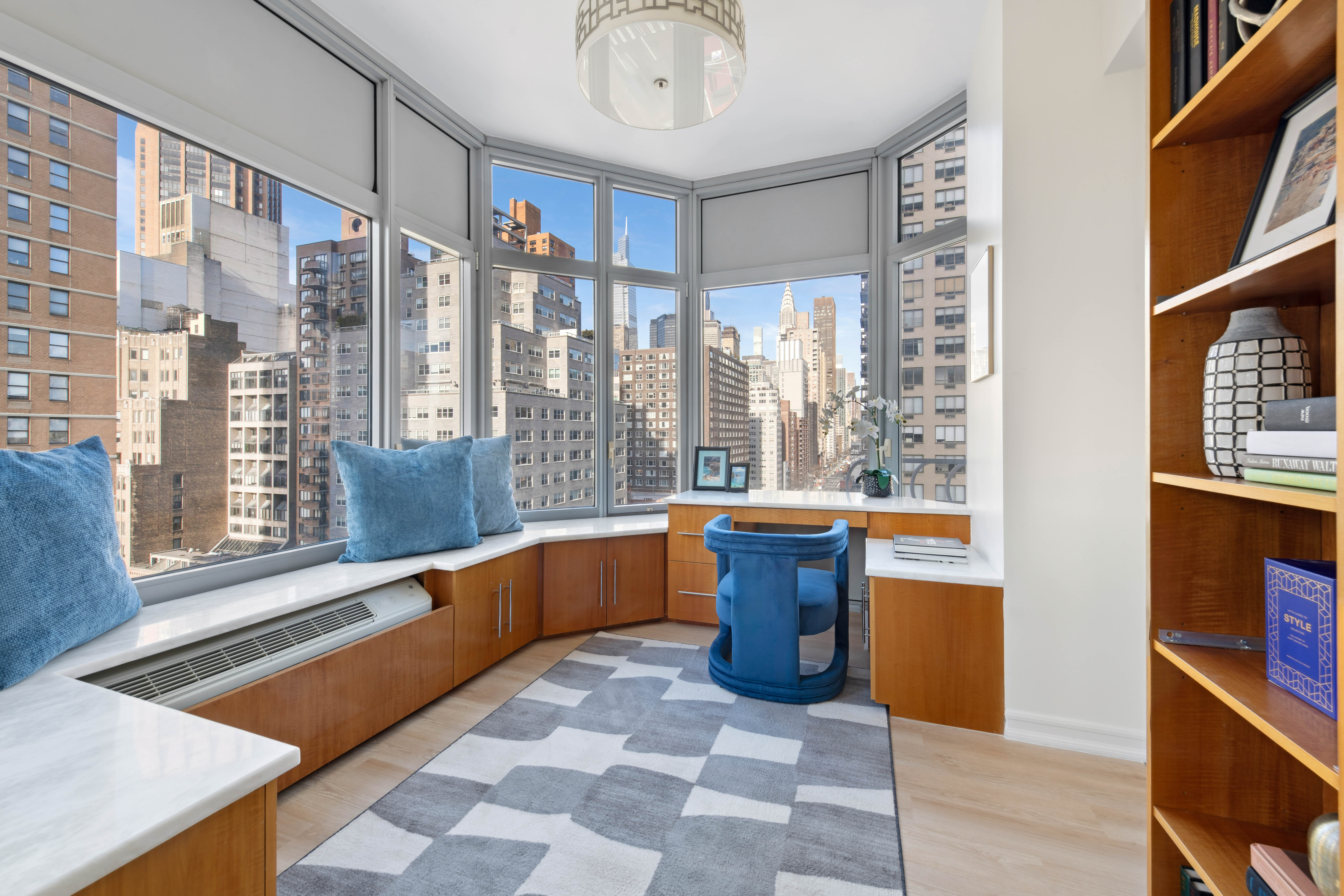 200 East 32nd Street, Unit 11D Manhattan, NY 10016 - Photo 6 of 19 a large room with pool table and windows
