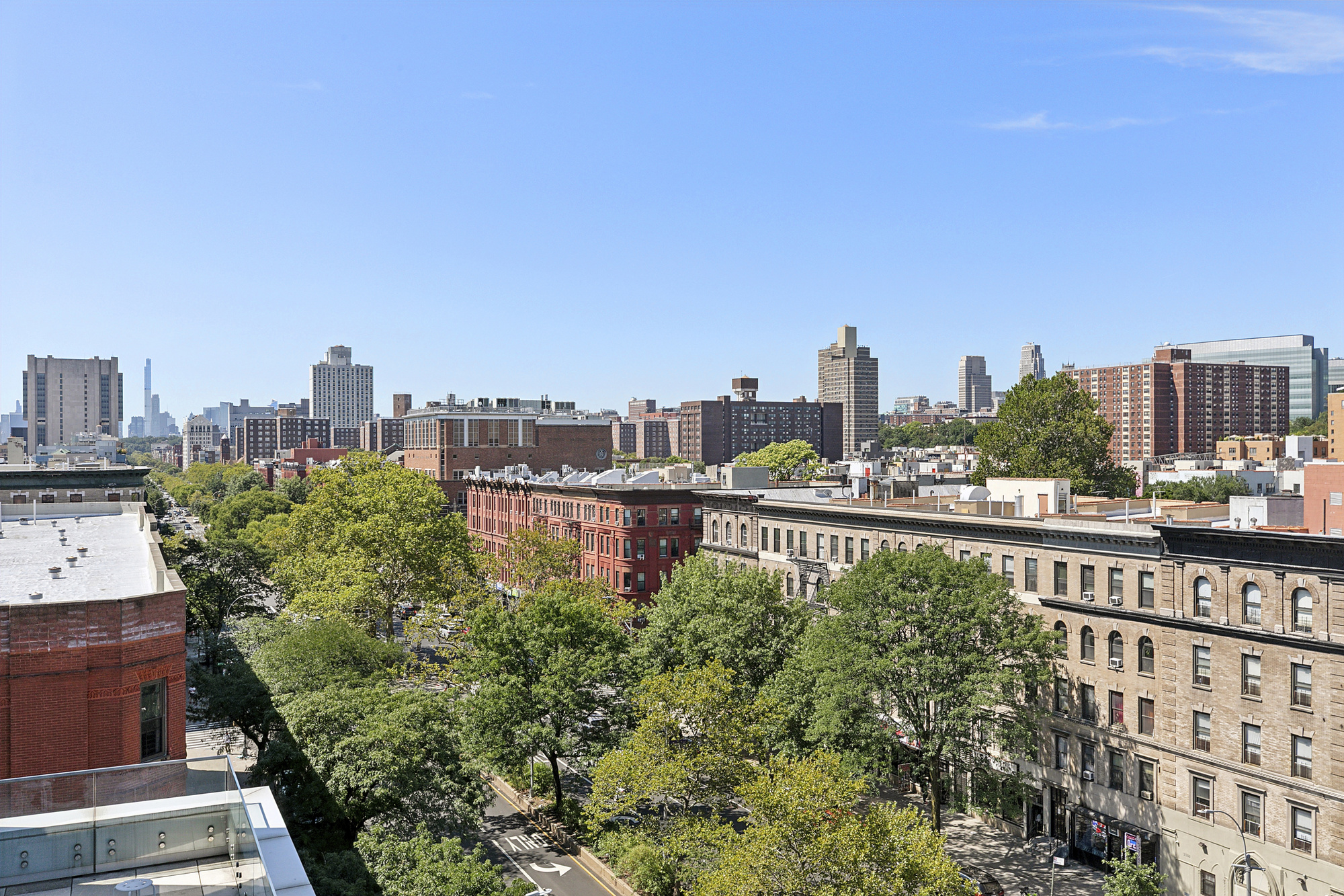 2351 Adam Clayton Powell Jr Boulevard, Unit PH23 Manhattan, NY 10030 - Photo 5 of 9 a view of a city with tall buildings