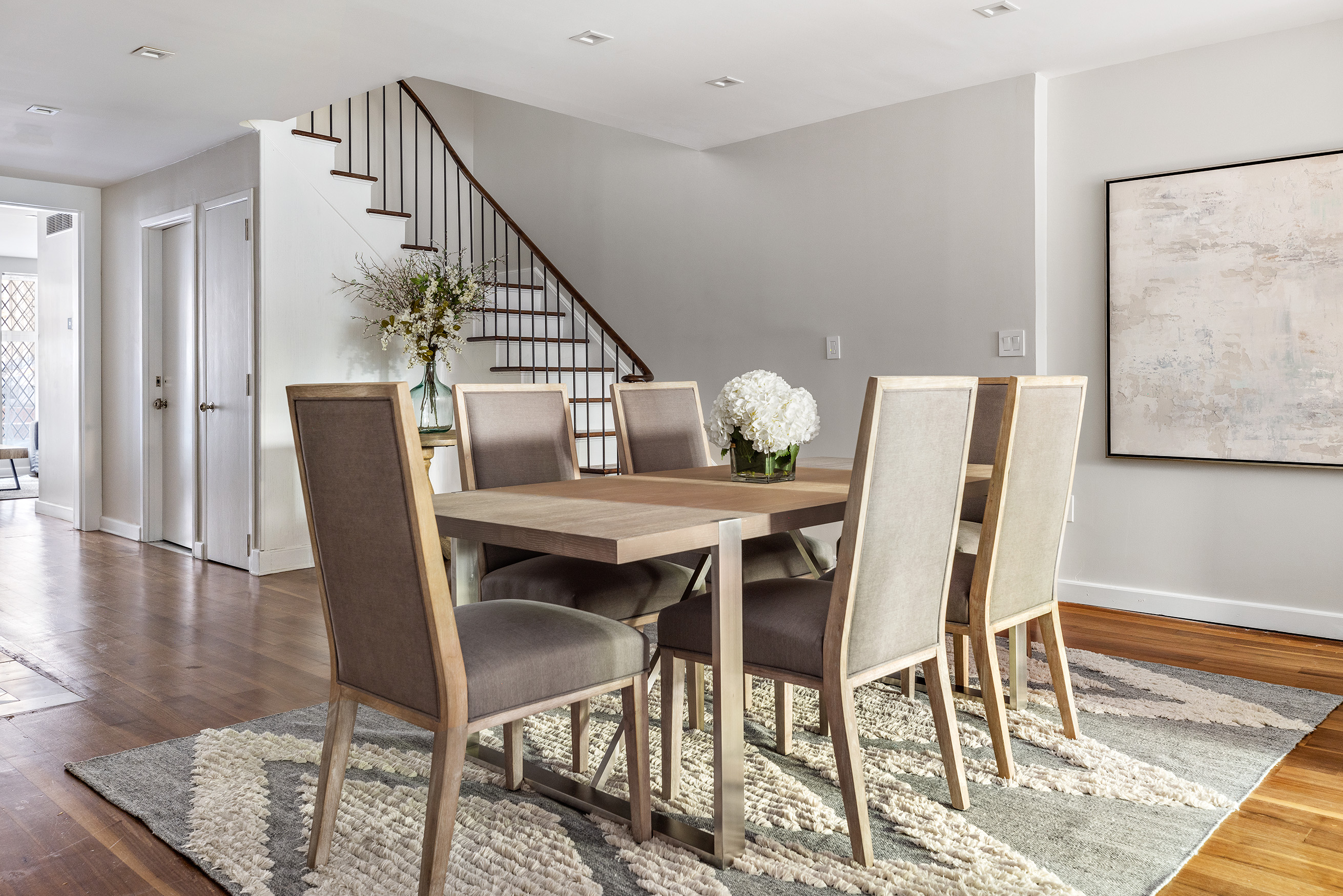 25 East 94th Street Manhattan, NY 10128 - Photo 27 of 33 a view of a dining room with furniture and wooden floor