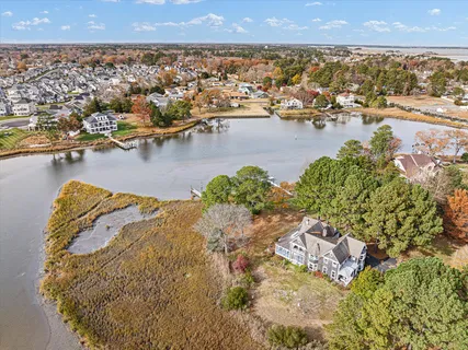 an ocean beach with lots of residential buildings and ocean view