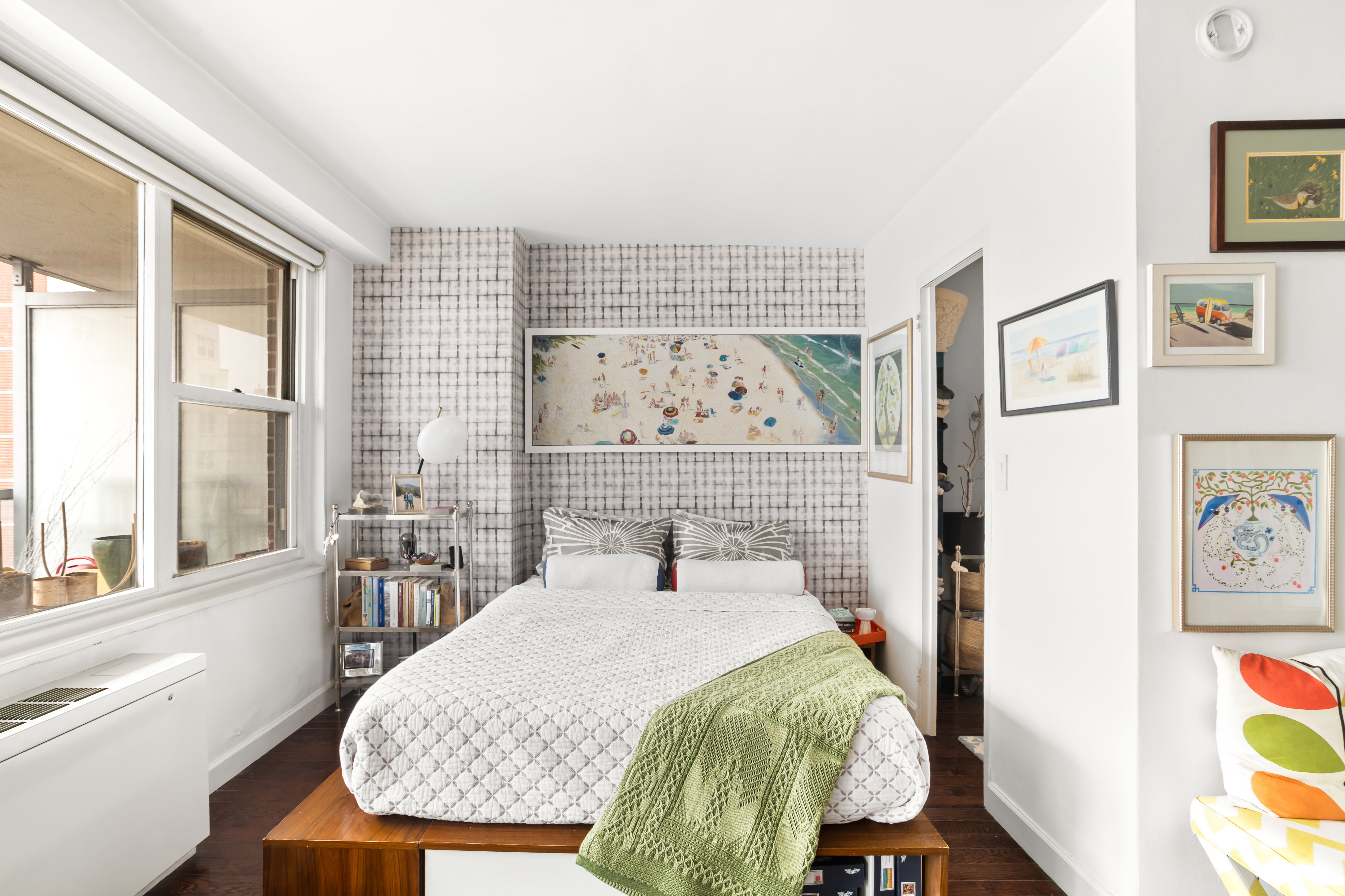 363 East 76th Street, Unit 14E Manhattan, NY 10021 - Photo 4 of 12 a bedroom with a bed a dresser and next to a window