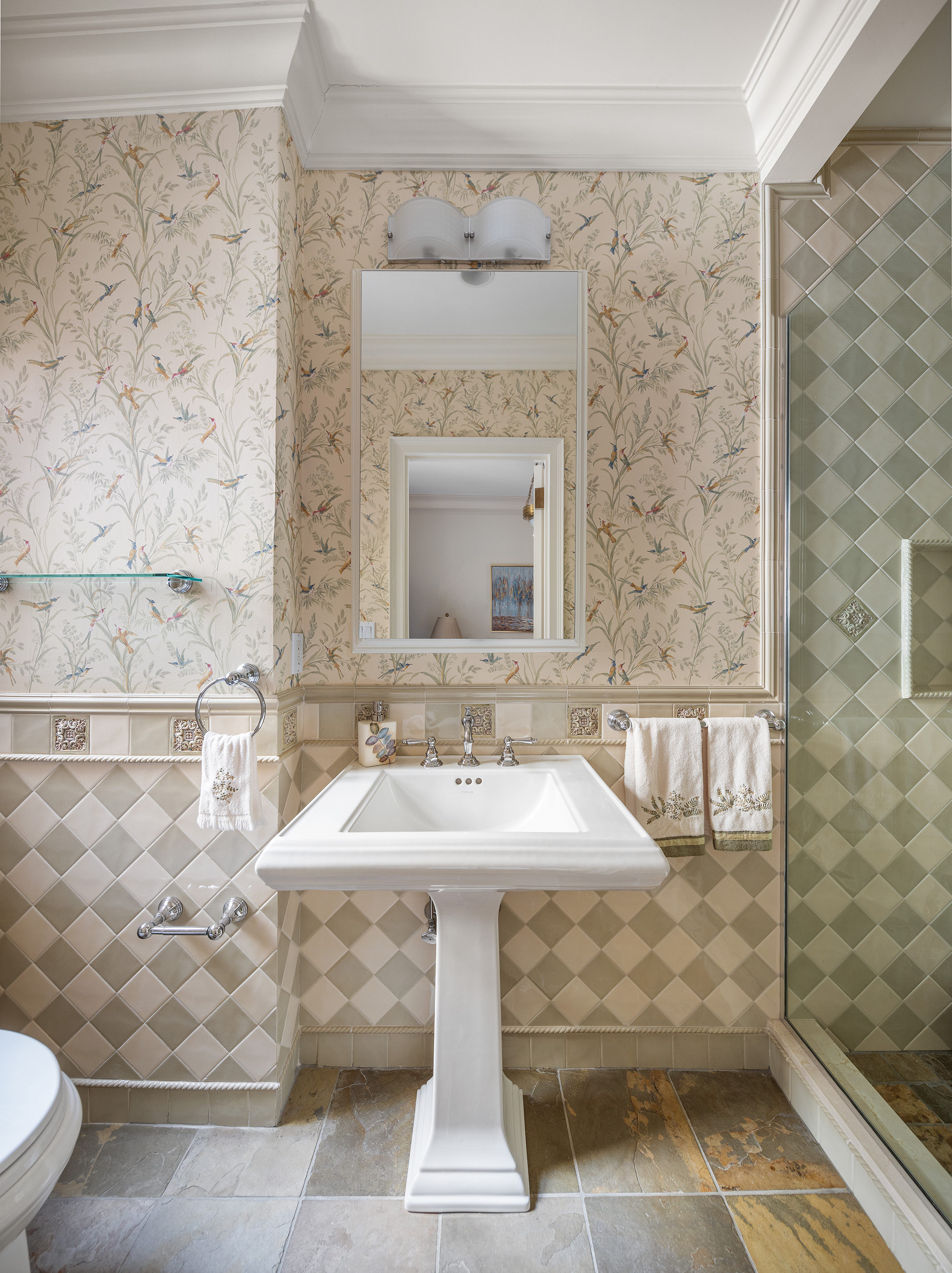1160 Park Avenue, Unit 8C Manhattan, NY 10128 - Photo 14 of 18 a bathroom with a sink and a mirror