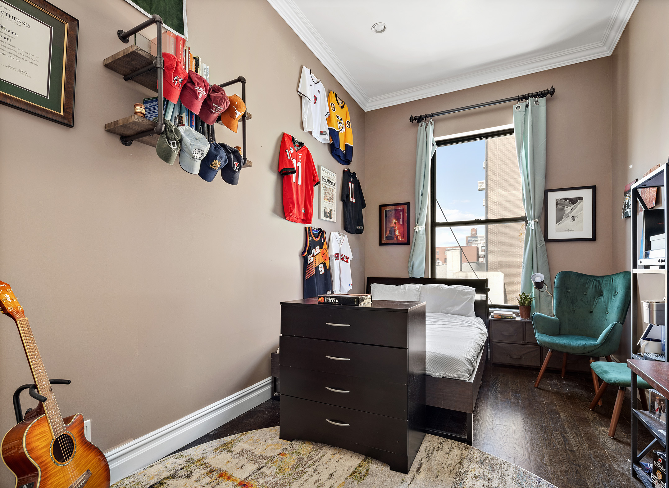 733 9th Avenue, Unit 5 Manhattan, NY 10019 - Photo 6 of 9 a bedroom with a workspace