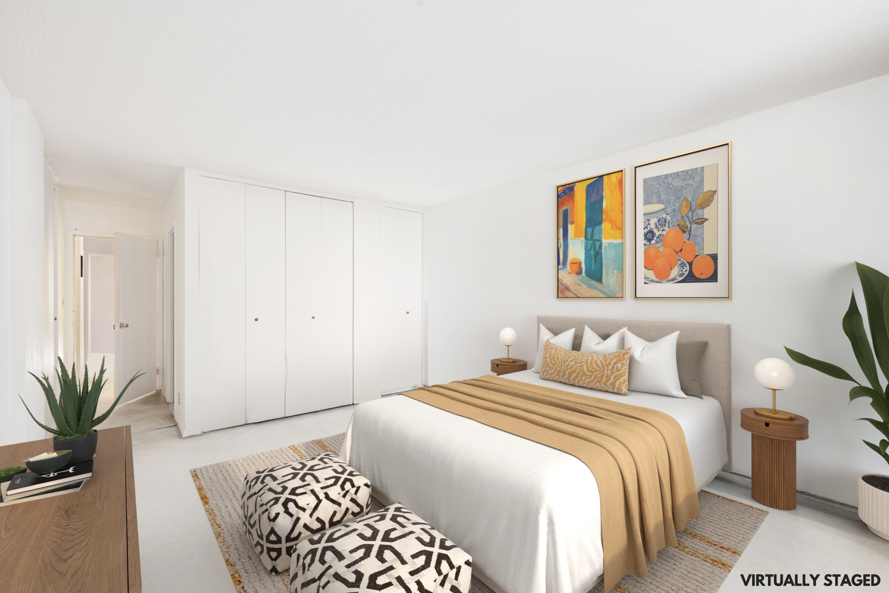 555 Main Street, Unit 512 Manhattan, NY 10044 - Photo 5 of 18 a bedroom with a large bed and a painting on the wall