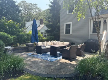a view of a patio with a chairs and tables