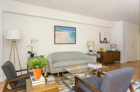 a living room with furniture and a couch