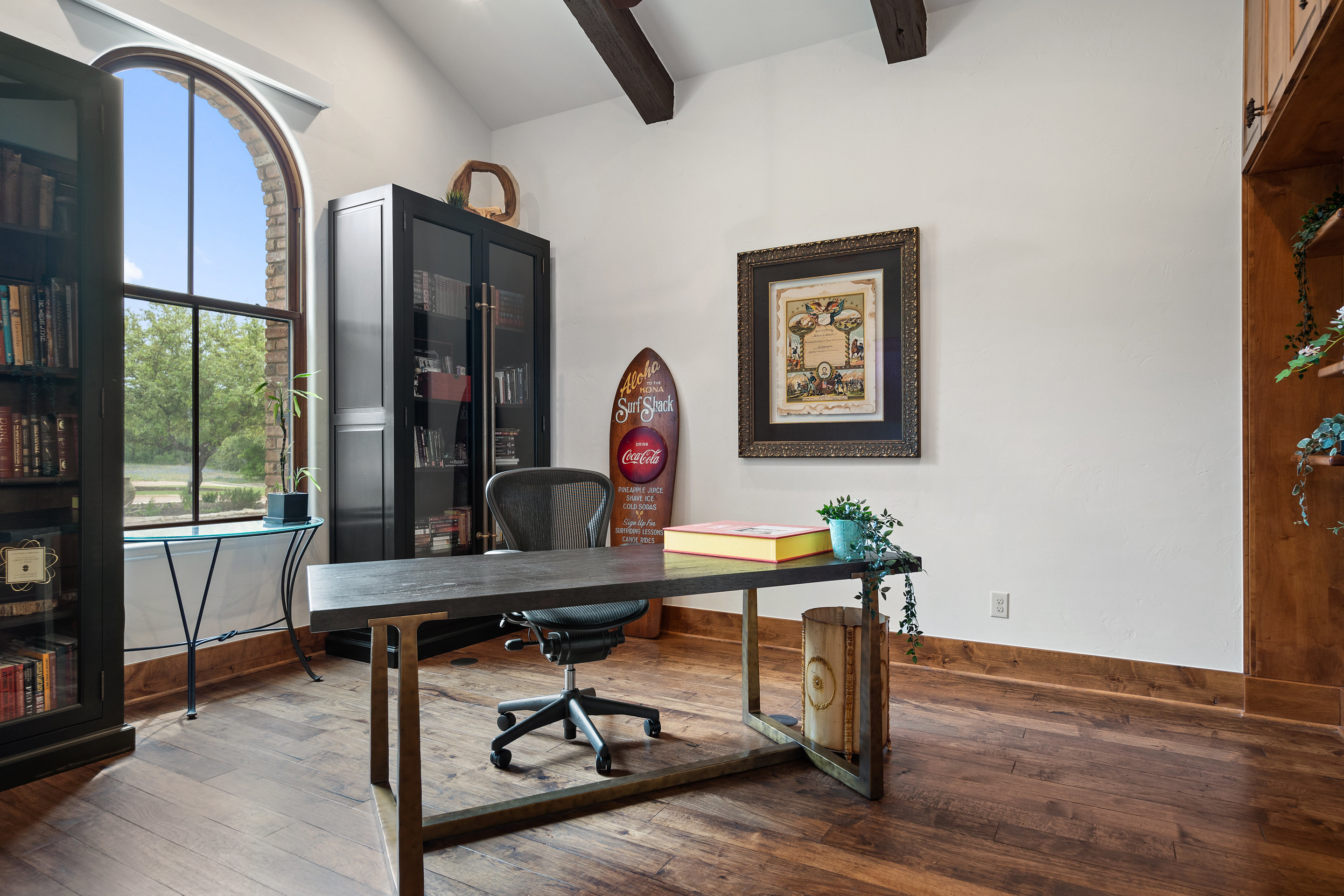 808 Rivercliff Drive Spicewood, TX 78669 - Photo 51 of 71 a view of a workspace with furniture and a window