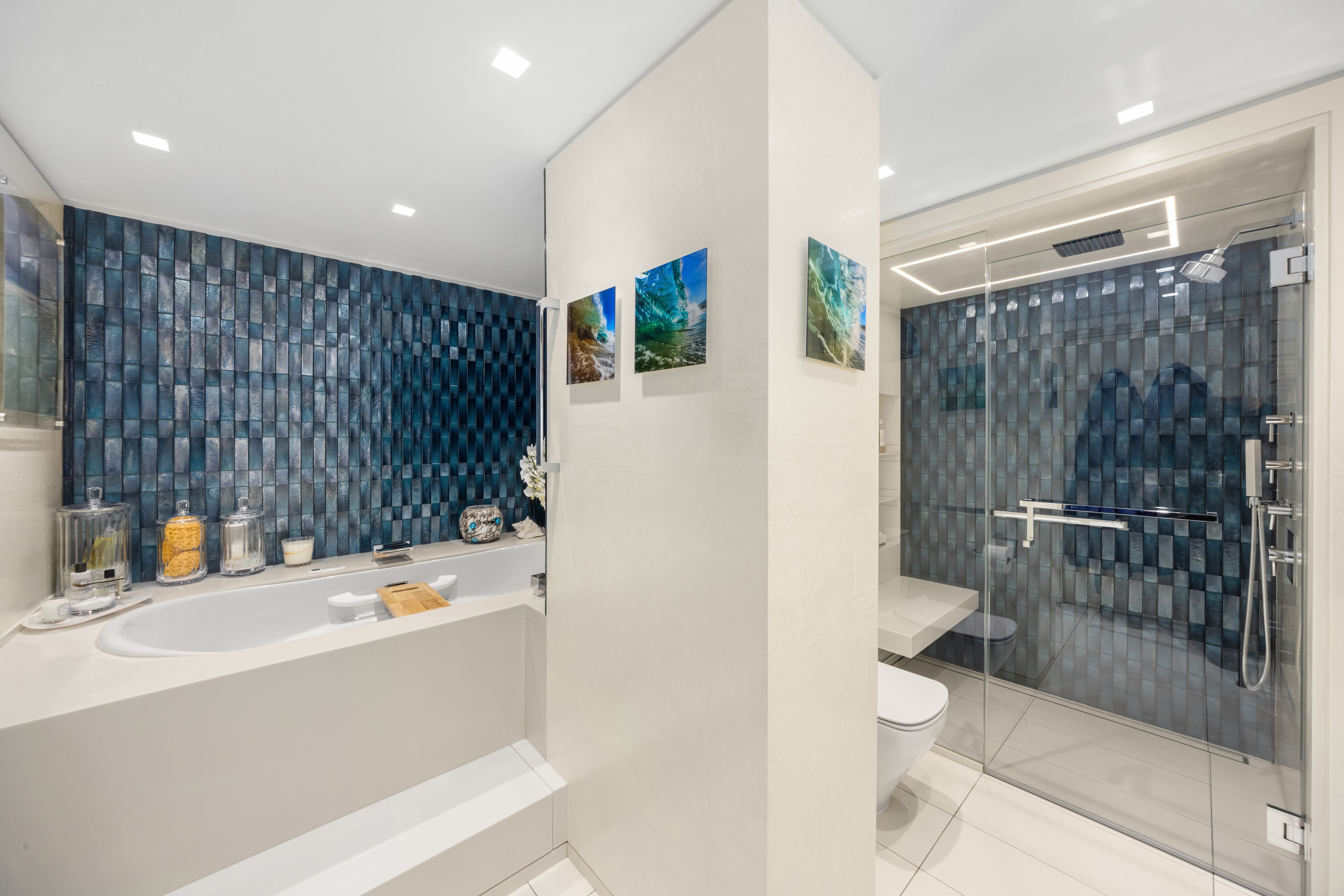 150 West 56th Street, Unit 3901 Manhattan, NY 10019 - Photo 17 of 25 a bathroom with a sink toilet and shower