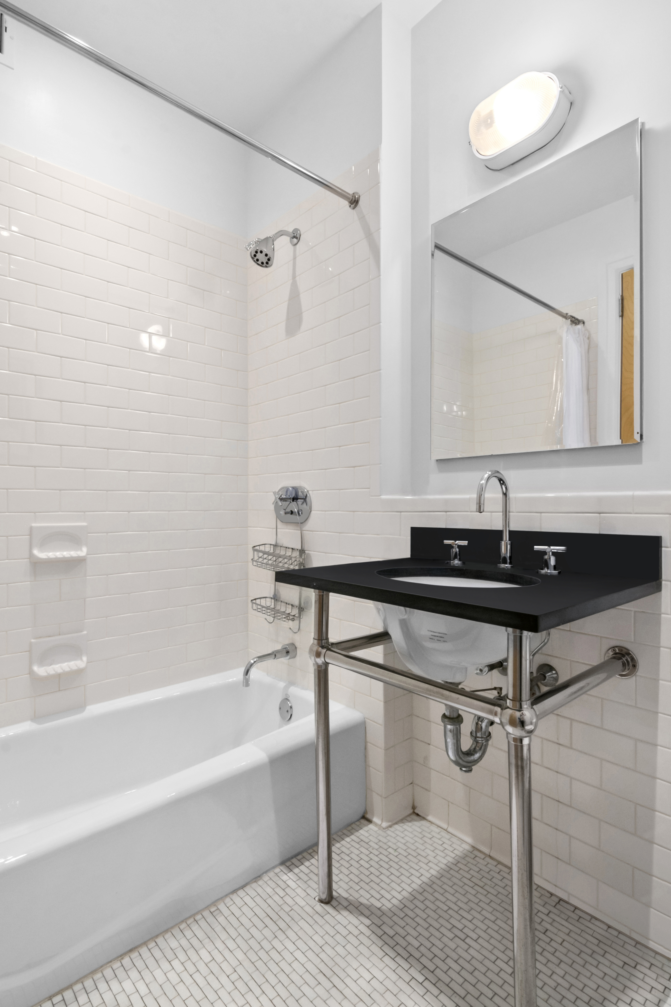 110 Livingston Street, Unit 8A Brooklyn, NY 11201 - Photo 6 of 12 a bathroom with a sink and a bathtub