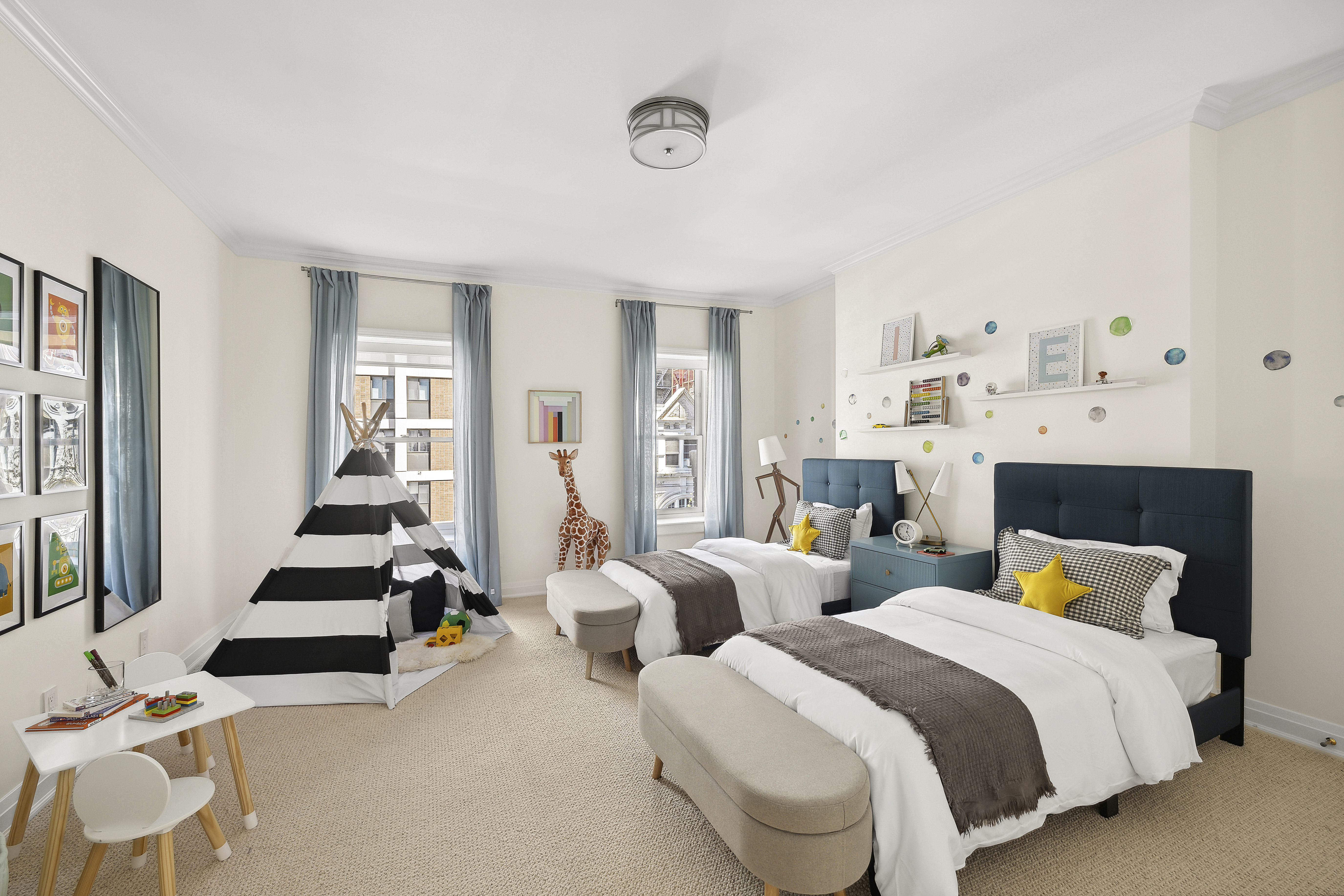 50 East 73rd Street Manhattan, NY 10021 - Photo 21 of 32 a bedroom with two beds and large windows