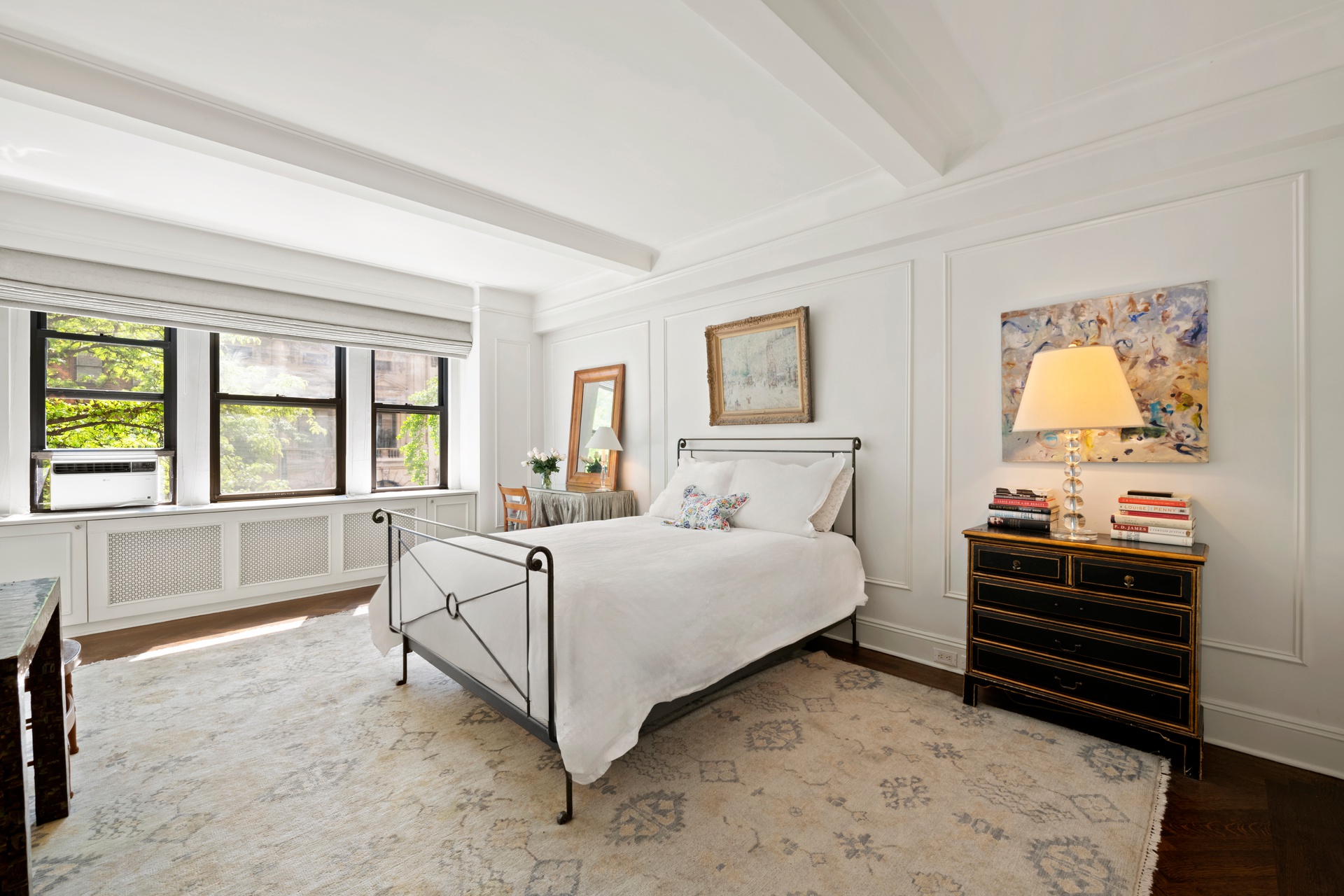 225 East 79th Street, Unit 3A Manhattan, NY 10075 - Photo 5 of 10 a bedroom with a bed and a large window