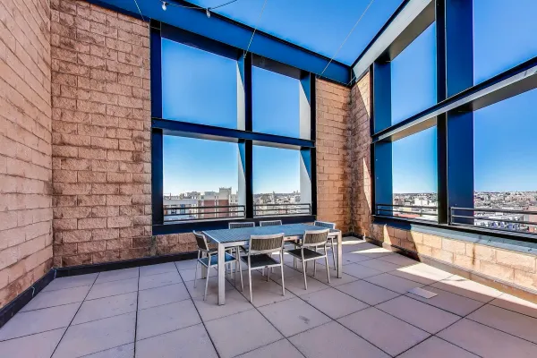 a view of a chairs with a table and chairs in patio