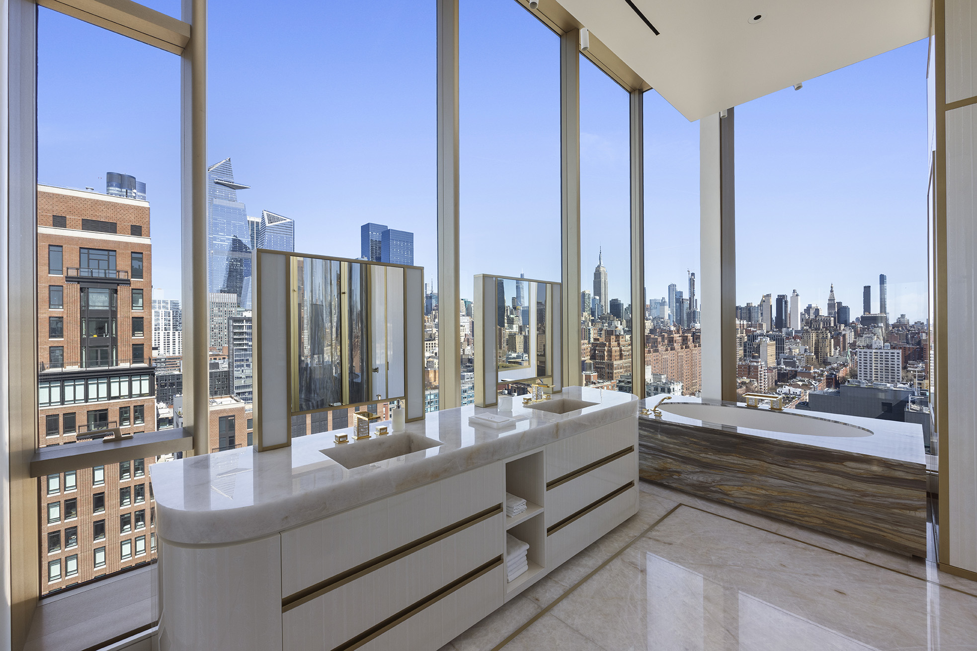 551 West 21st Street, Unit PH Manhattan, NY 10011 - Photo 28 of 51 a living room with couch and a large window