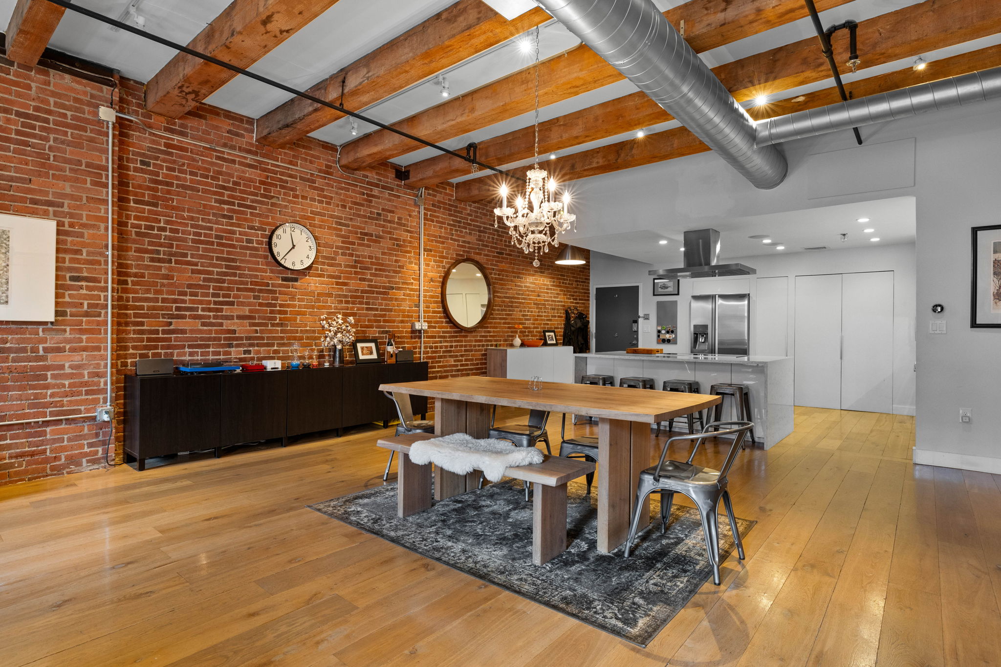 33 Sleeper Street, Unit 307 Boston, MA 02210 - Photo 10 of 15 a view of a dining room with furniture