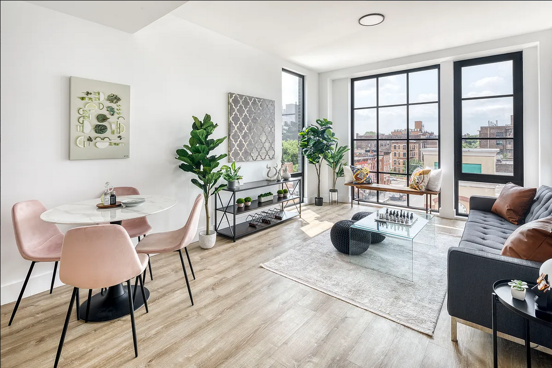 1425 Fulton Street, Unit 4A Brooklyn, NY 11216 - Photo 1 of 12 a living room with furniture and a large window