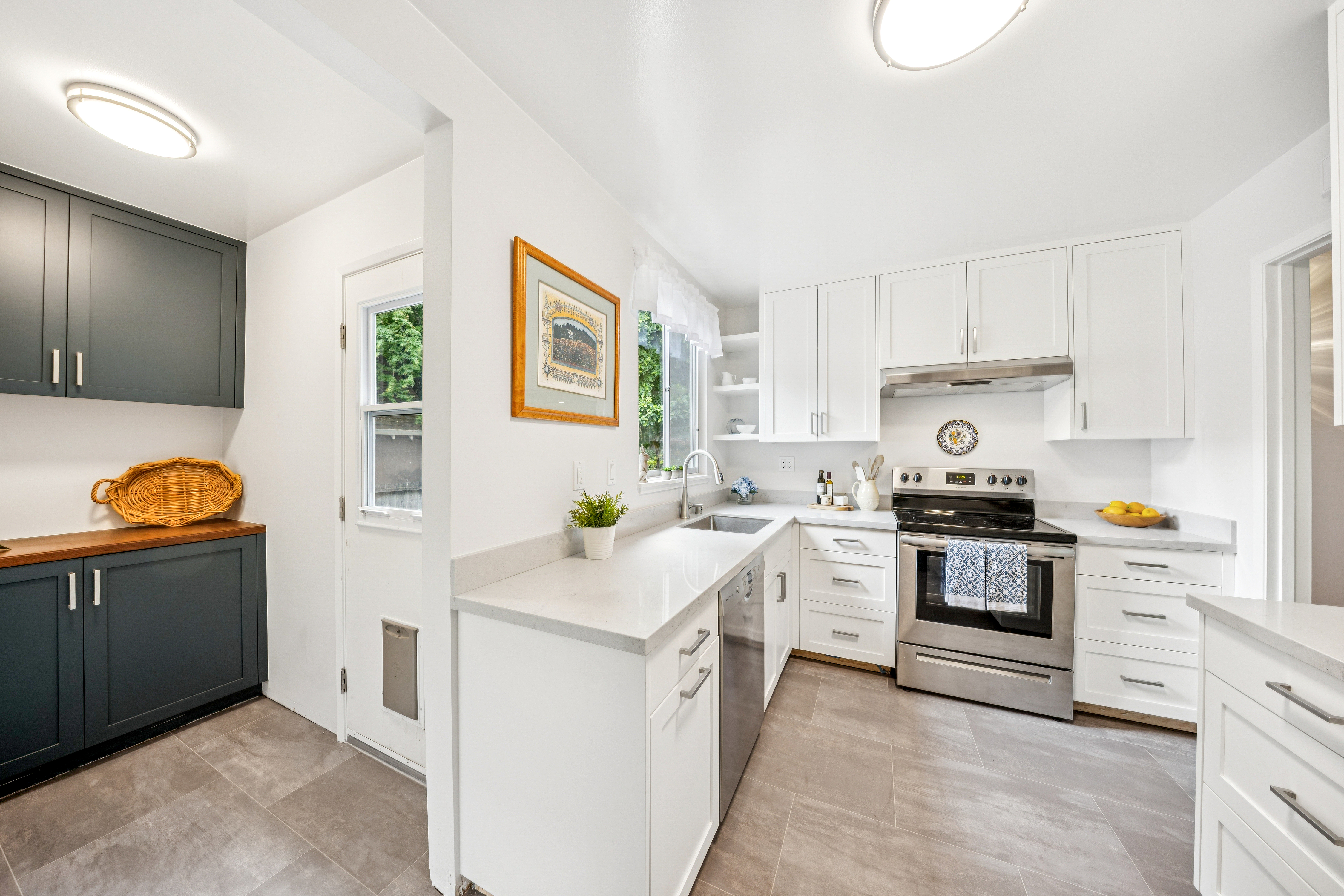 77 Bothin Road Fairfax, CA 94930 - Photo 8 of 32 a kitchen with stainless steel appliances granite countertop a sink and a stove