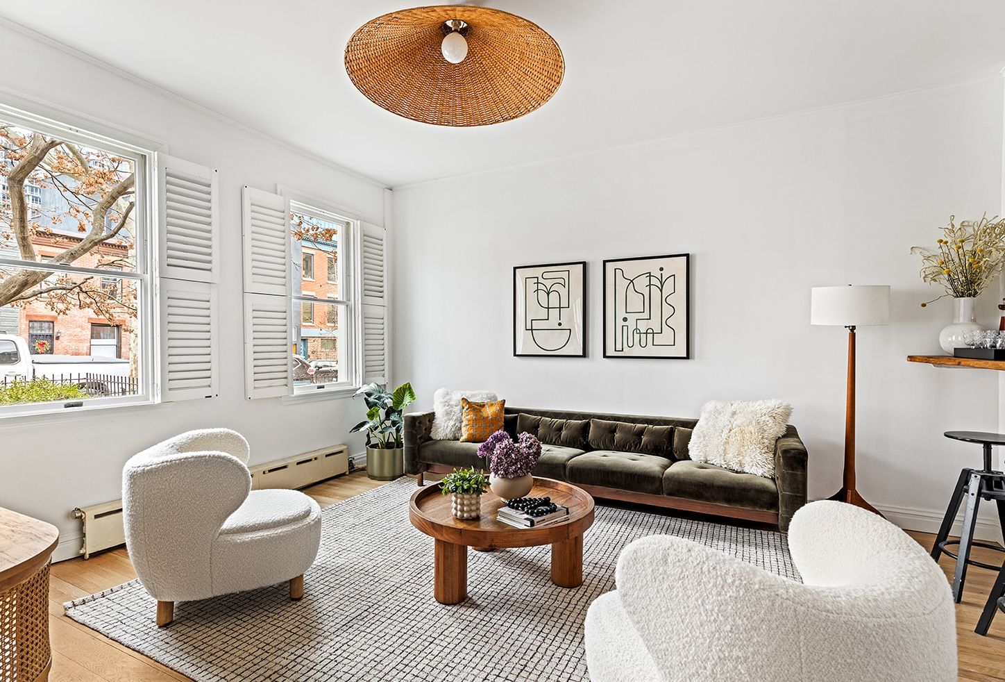 a living room with furniture rug and window