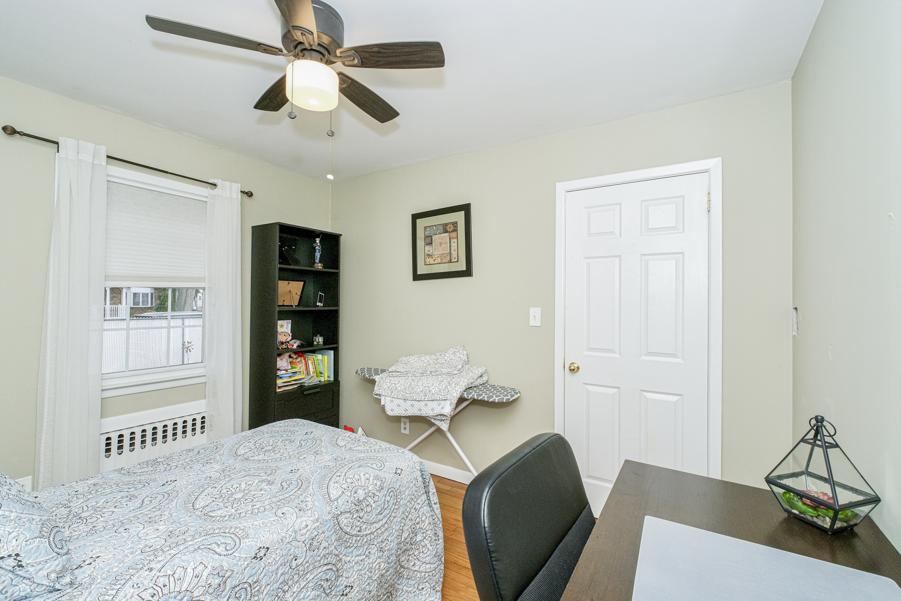 503 Falcon Avenue Staten Island, NY 10306 - Photo 16 of 30 a bedroom with a bed furniture and a window