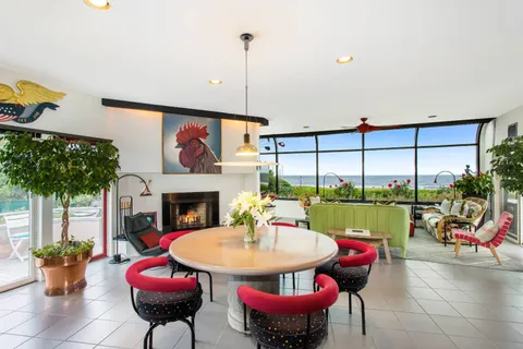 a dinning table and chairs in a patio
