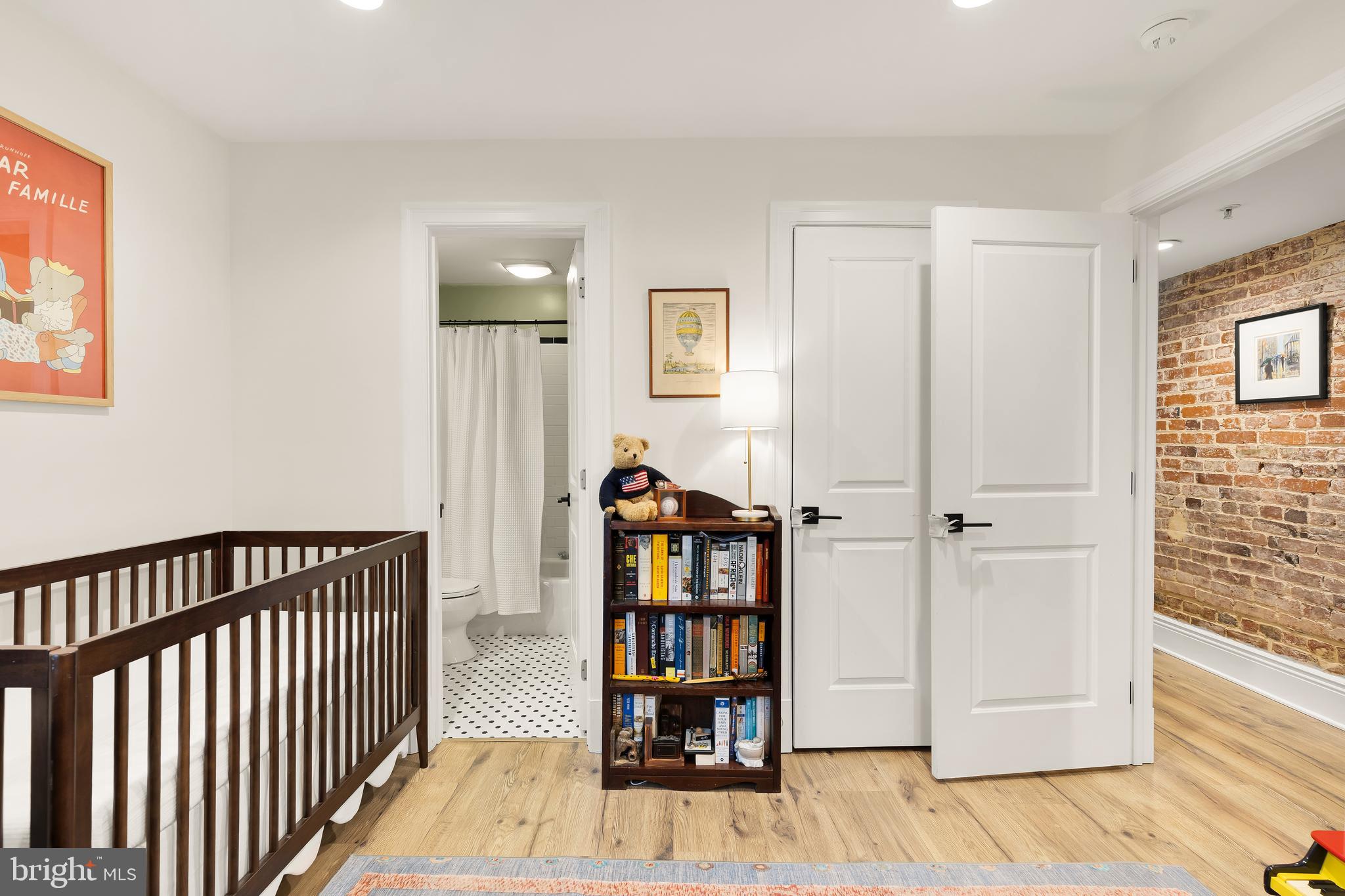 1354 Kenyon Street Northwest, Unit G Washington, DC 20010 - Photo 25 of 37 a view of a hallway with wooden floor and entryway