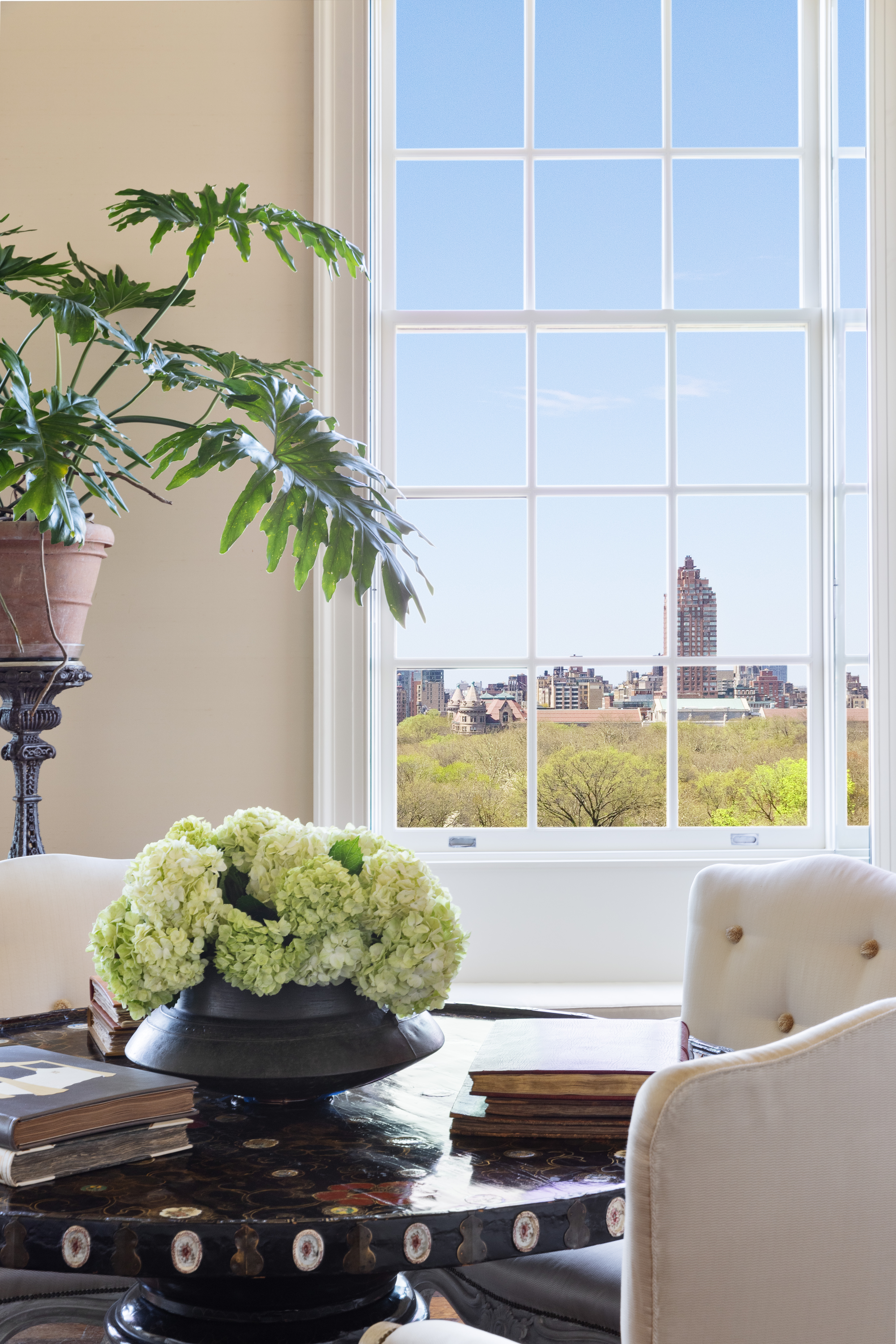 960 5th Avenue Manhattan, NY 10075 - Photo 5 of 13 a living room with furniture and a potted plant