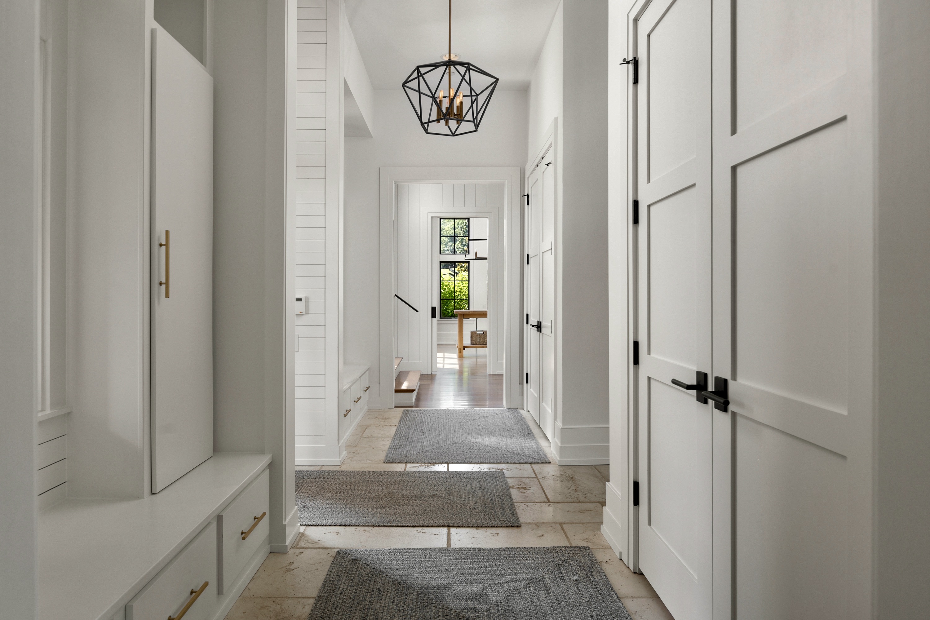 5747 Garrison Road Franklin, TN 37064 - Photo 28 of 47 a view of a hallway with wooden floor and dining room