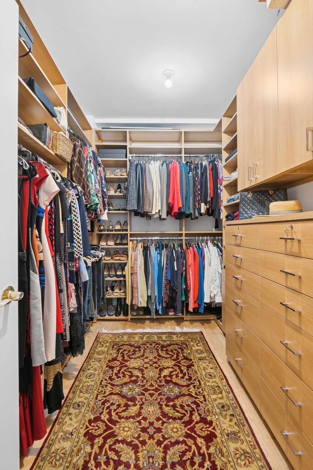 514 West End Avenue, Unit 8/9A Manhattan, NY 10024 - Photo 18 of 24 a view of walk in closet with clothes