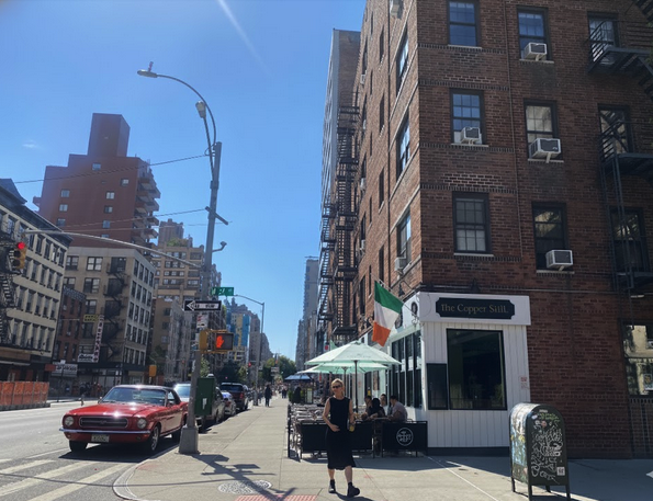 261 West 22nd Street, Unit 23 Manhattan, NY 10011 - Photo 9 of 14 a view of street with parked cars