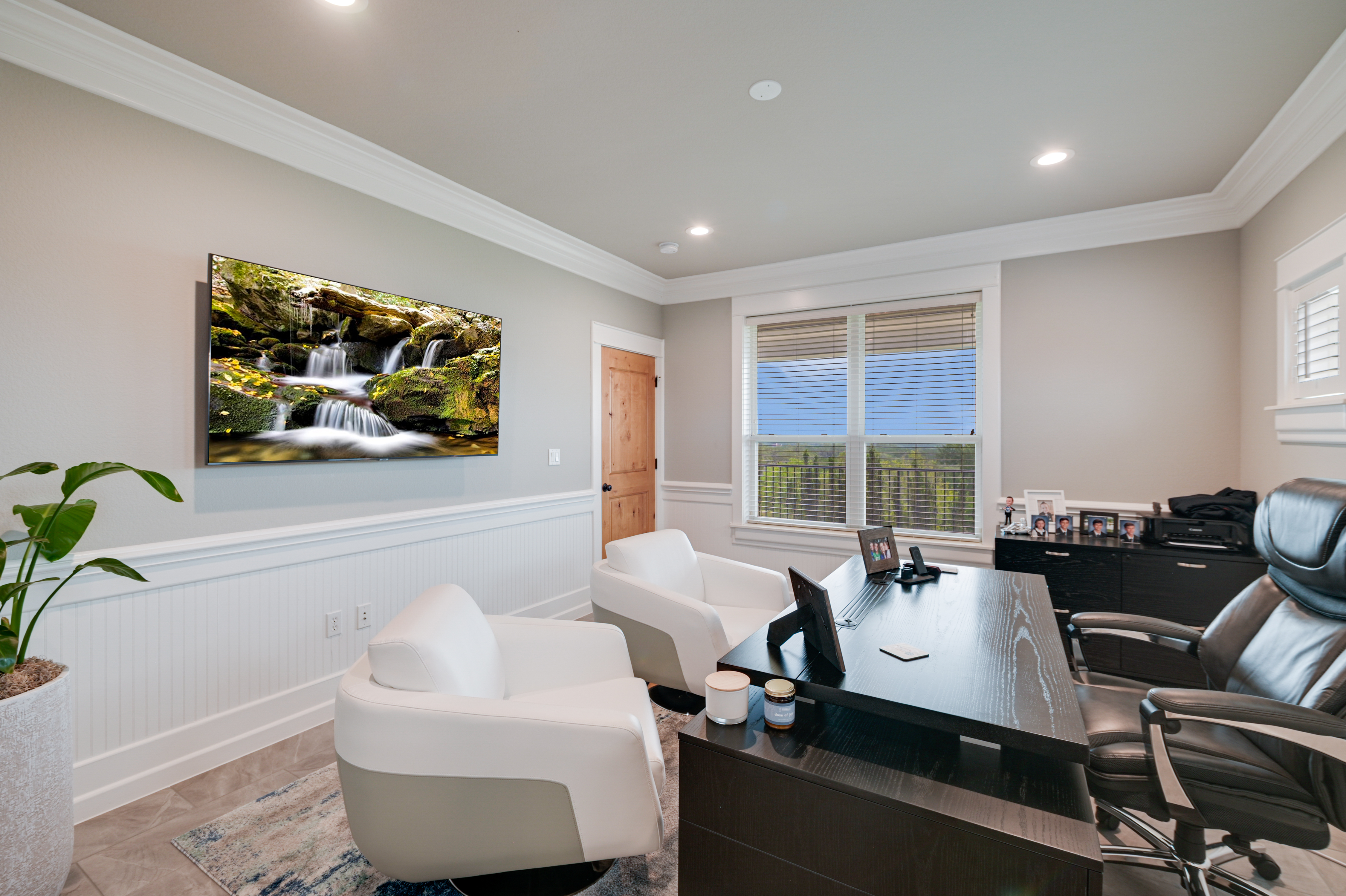 14913 Murfin Road Austin, TX 78734 - Photo 24 of 40 a living room with furniture and a flat screen tv