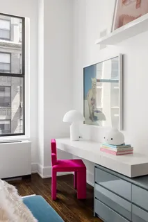 a bathroom with a sink vanity and a mirror