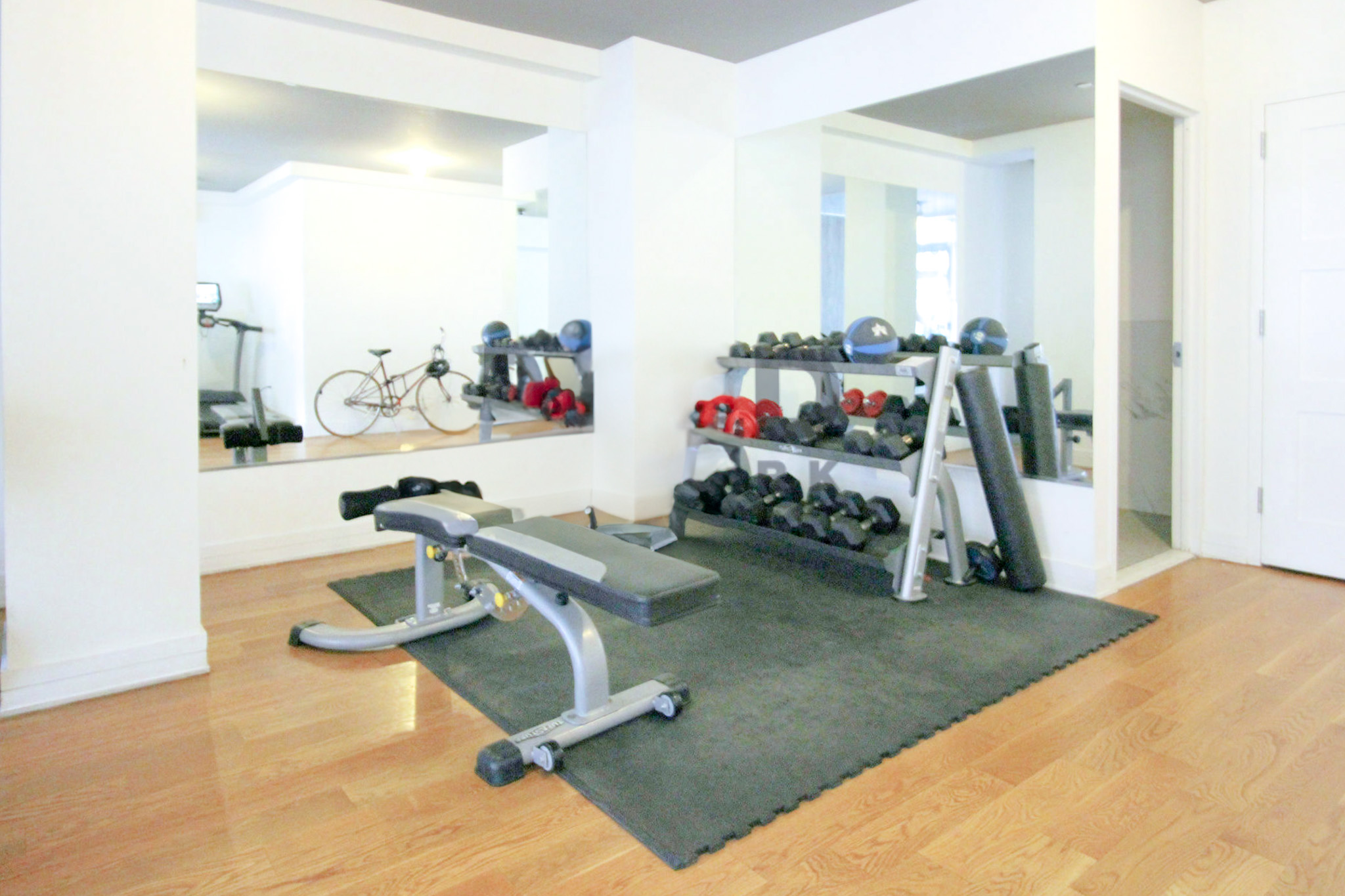 224 Wythe Avenue, Unit 68E Brooklyn, NY 11249 - Photo 9 of 10 a view of a room with gym equipment