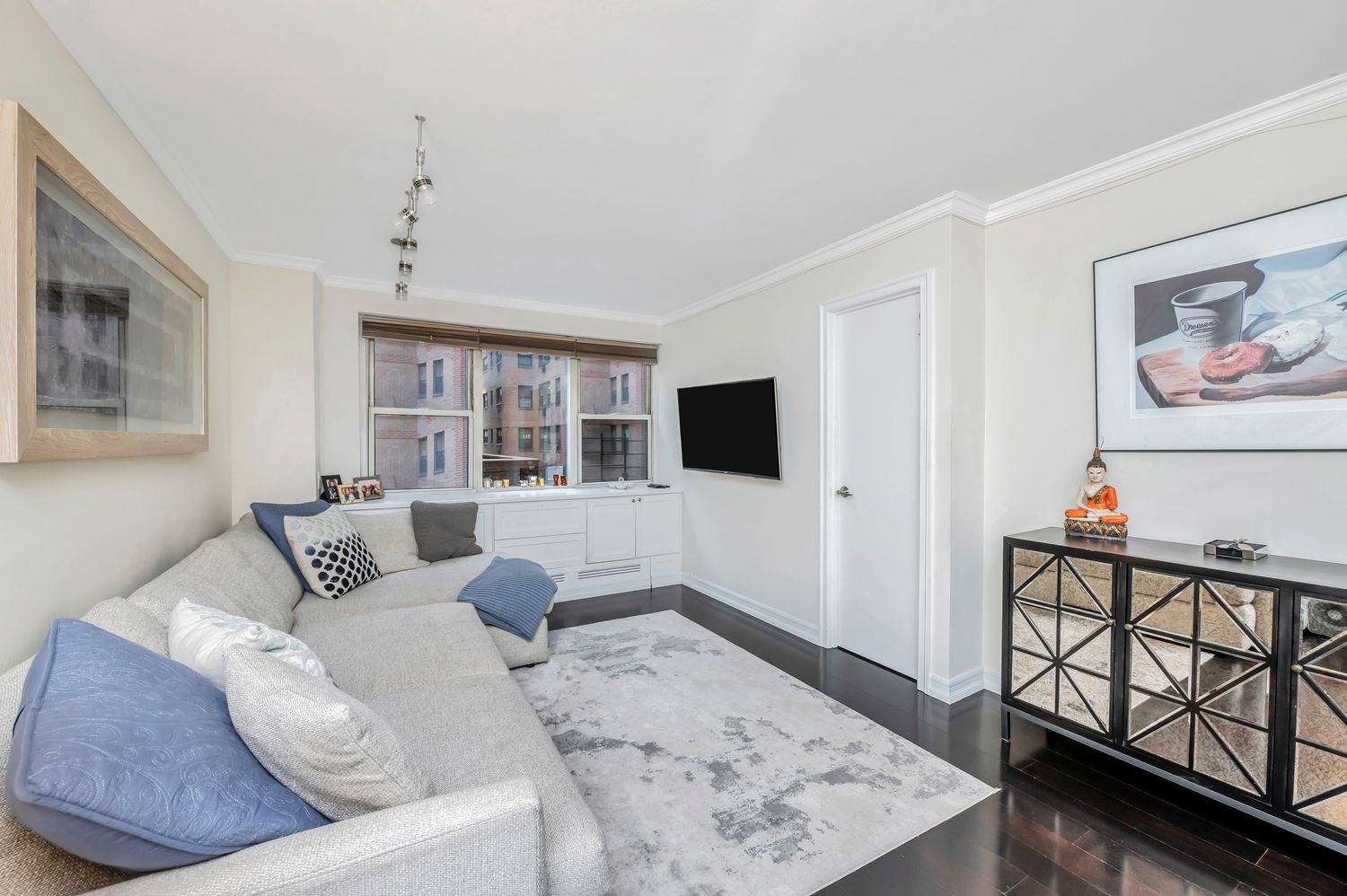 333 East 79th Street, Unit 2R Manhattan, NY 10075 - Photo 3 of 13 a bedroom with furniture and a window