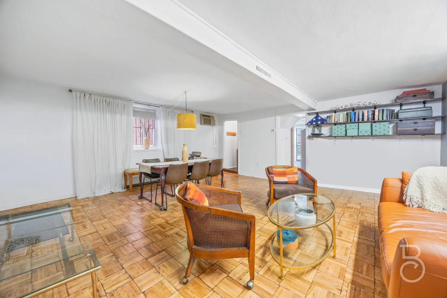 a dining room with furniture and a table