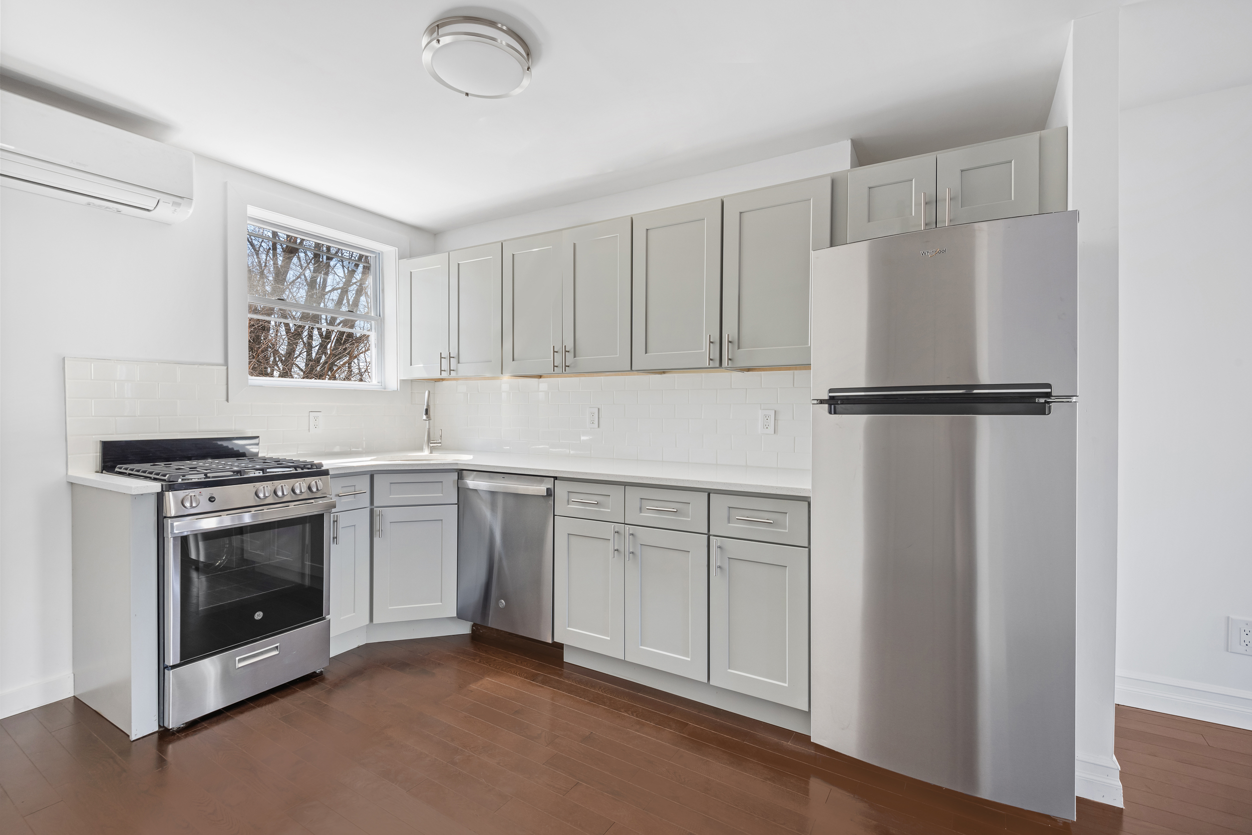 404 A 17th Street, Unit 3 Brooklyn, NY 11215 - Photo 5 of 9 a kitchen with cabinets and stainless steel appliances