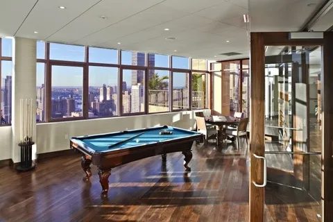 a room with furniture and wooden floor